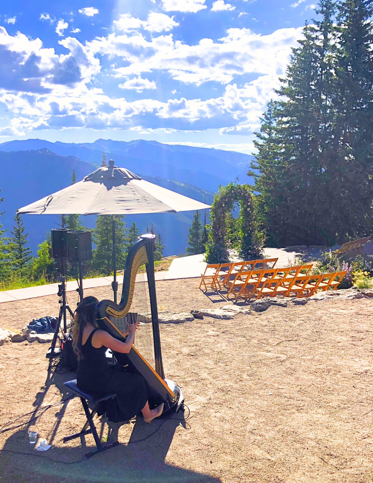 Jenna Hunt performing harp at The Little Nell wedding ceremony in Aspen