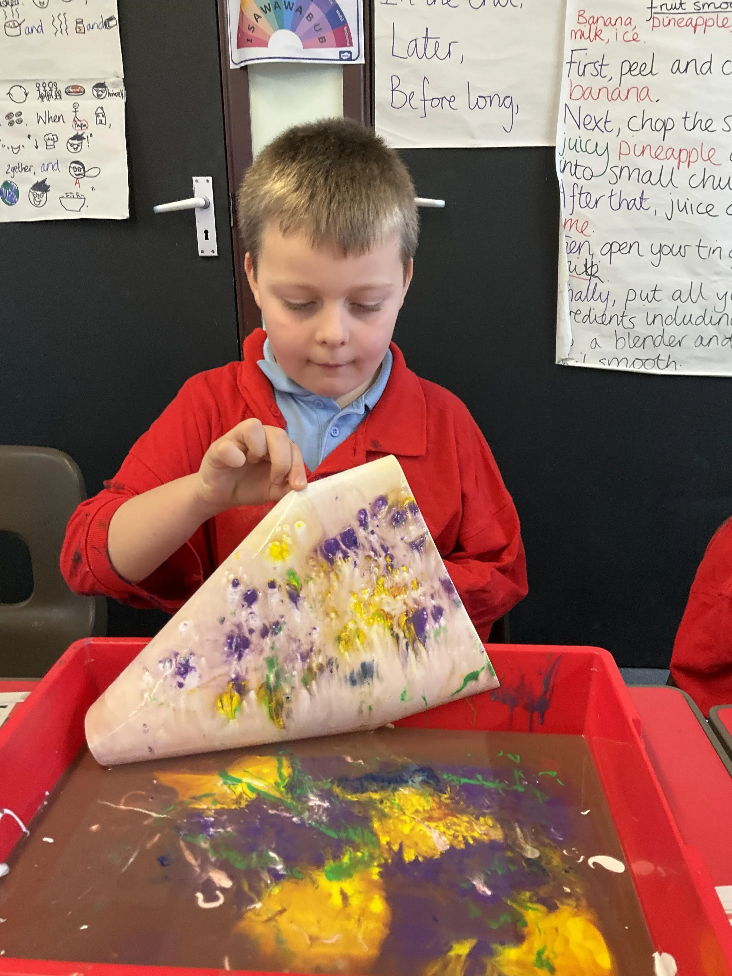 Art this term - here they are busy exploring tone and texture and mixture primary and secondary colours!