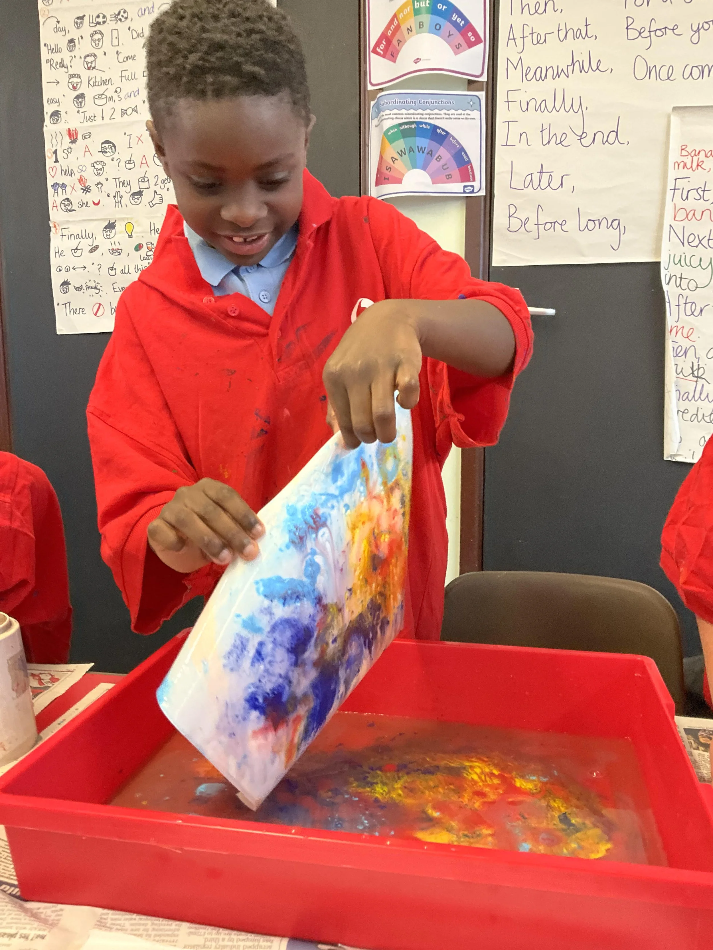 Art this term - here they are busy exploring tone and texture and mixture primary and secondary colours!