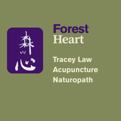 Sign with purple tree logo and words 'Forest Heart, Tracey Law, Acupuncture, Naturopath' on a green background.