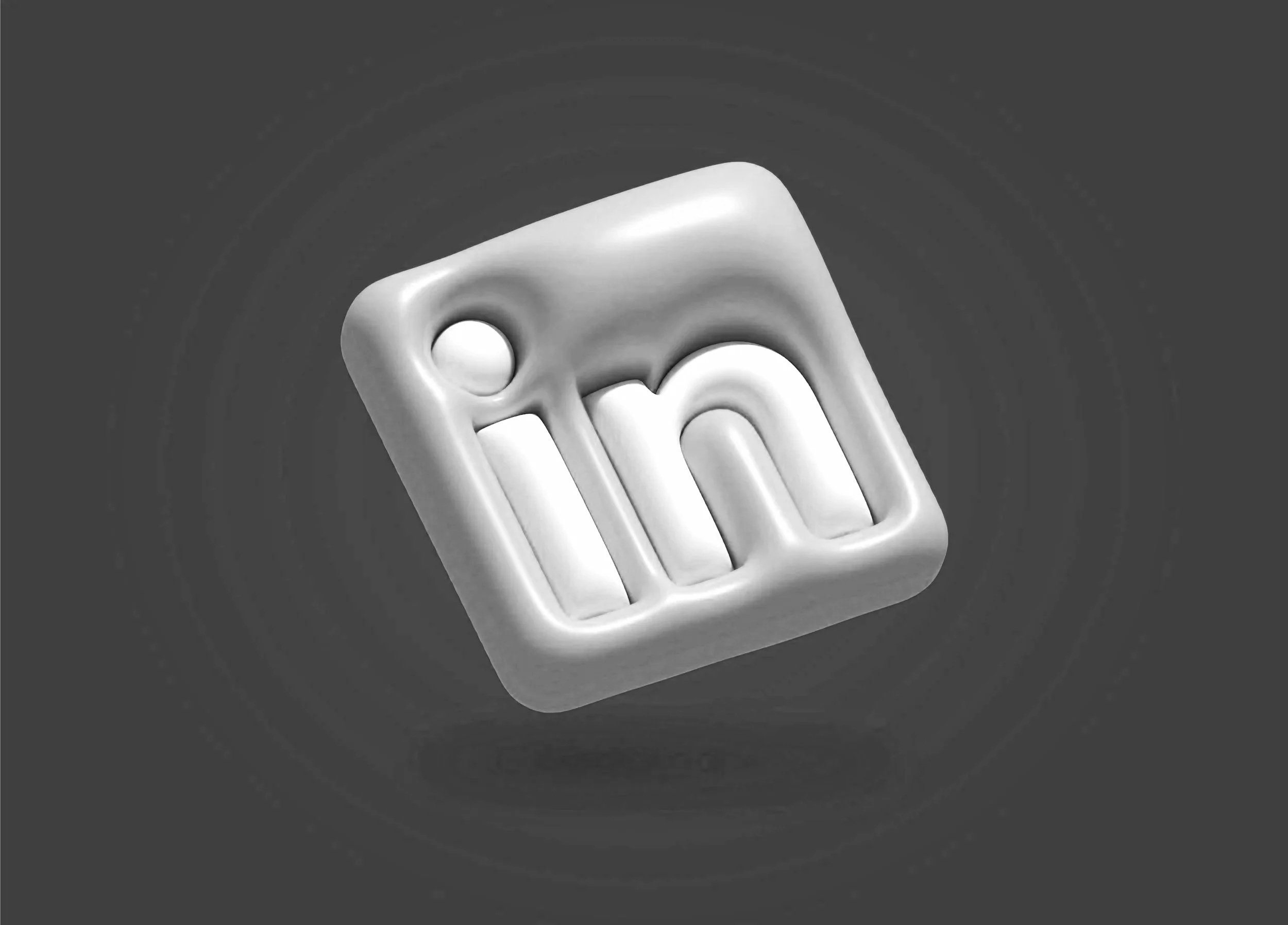 Silver LinkedIn logo with a stylized "in" in a 3D design on a dark gray background for D7 Solutions master in innovative solutions including smart lockers and smart pods