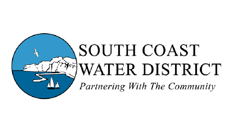 Logo of South Coast Water District featuring a blue circle with rugged coastline, water, a bird, and a sailboat. Text says 'South Coast Water District' with slogan 'Partnering With The Community'.