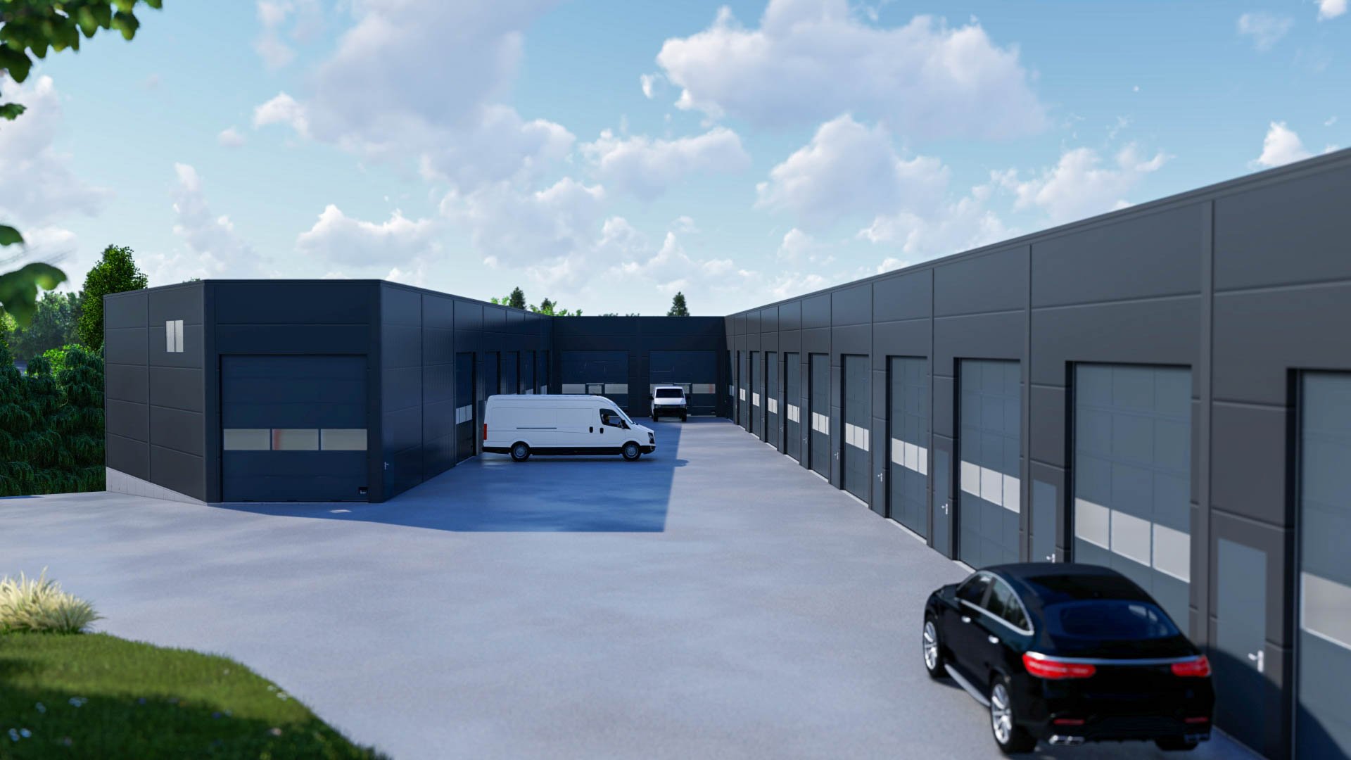 Modern industrial warehouse with loading docks, white commercial van, and black car parked outside under a partly cloudy sky.
