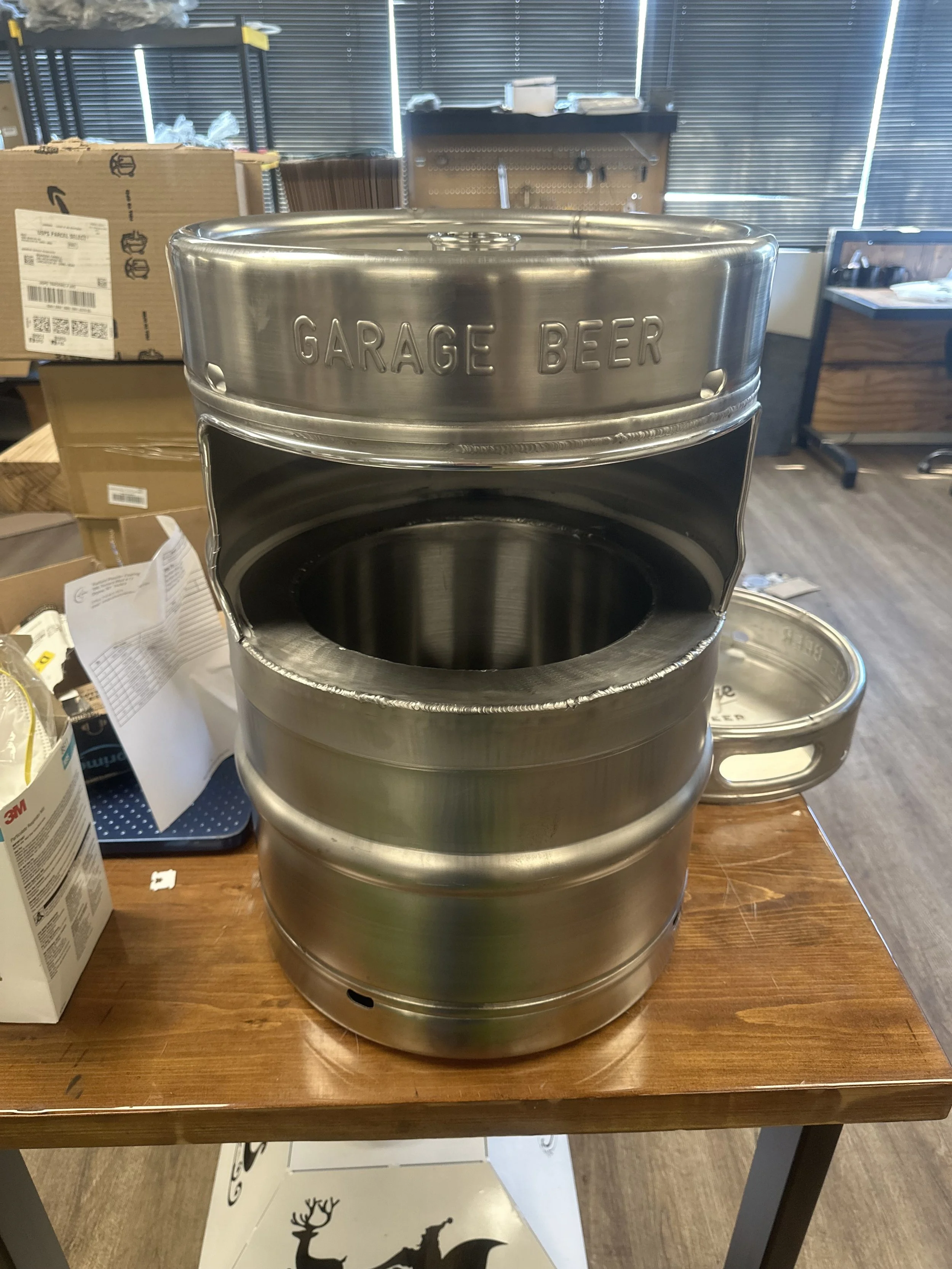 Keg Cooler designed for the owner of Garage Beer.  They added a custom wood top to finish off our work making the perfect Cooler/Side Table.