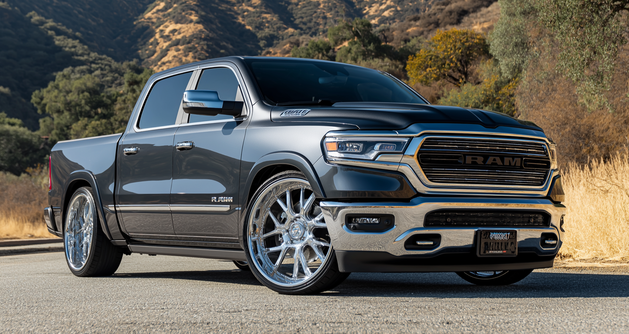 Lowered Ram 1500 showing improved stance using adjustable air suspension lowering links