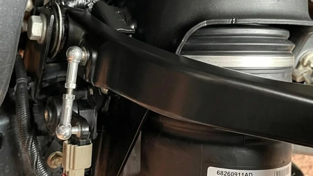 Ram 1500 with air suspension lowered using adjustable lowering links installed