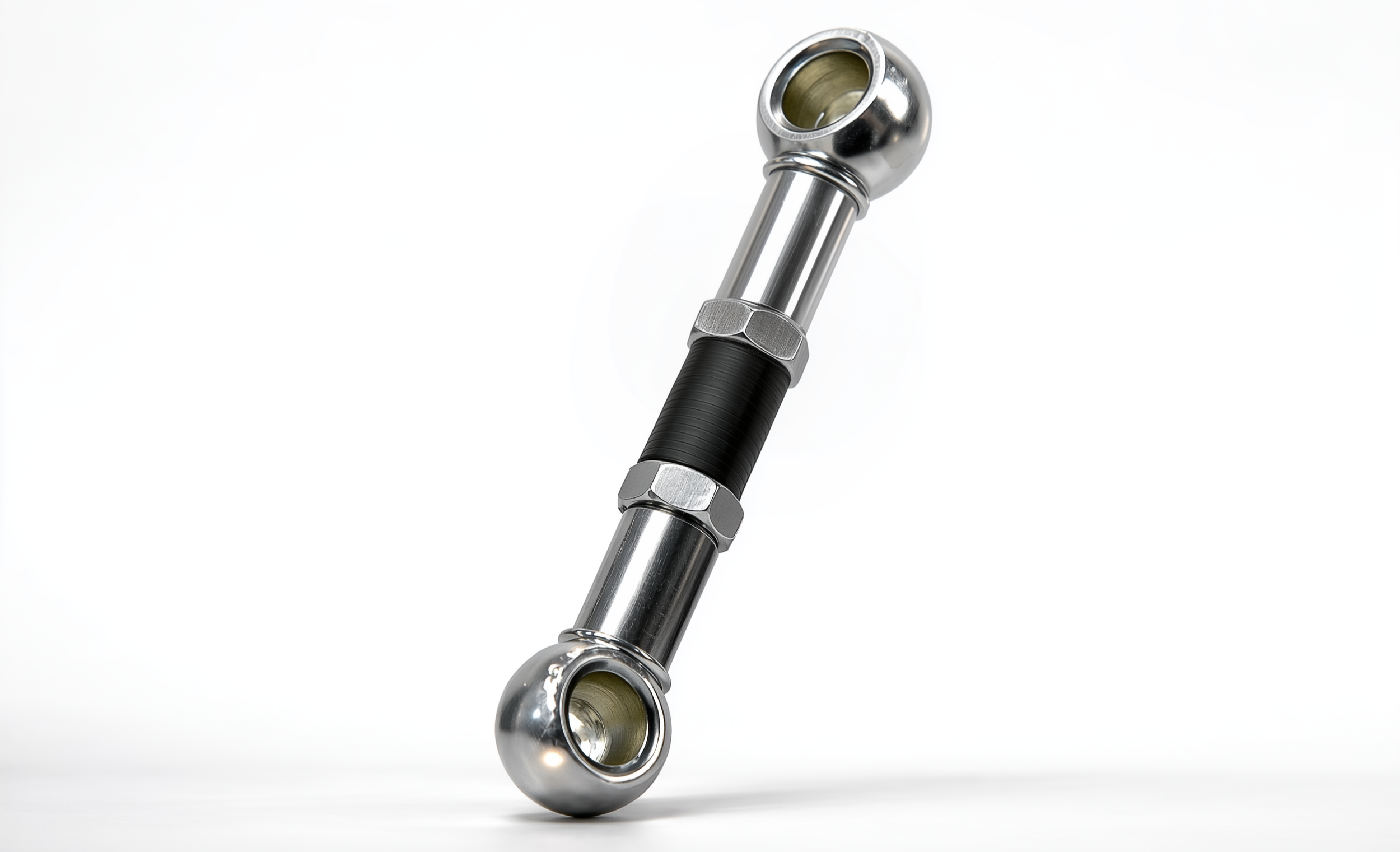 Close-up of adjustable lowering links for Ram 1500 showing threaded ride height adjustment design