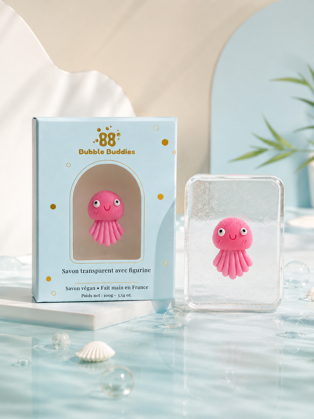 Bubble Buddies transparent hand made soap with pink octopus collecible figurine in pastel gift box. Made in France, vegan