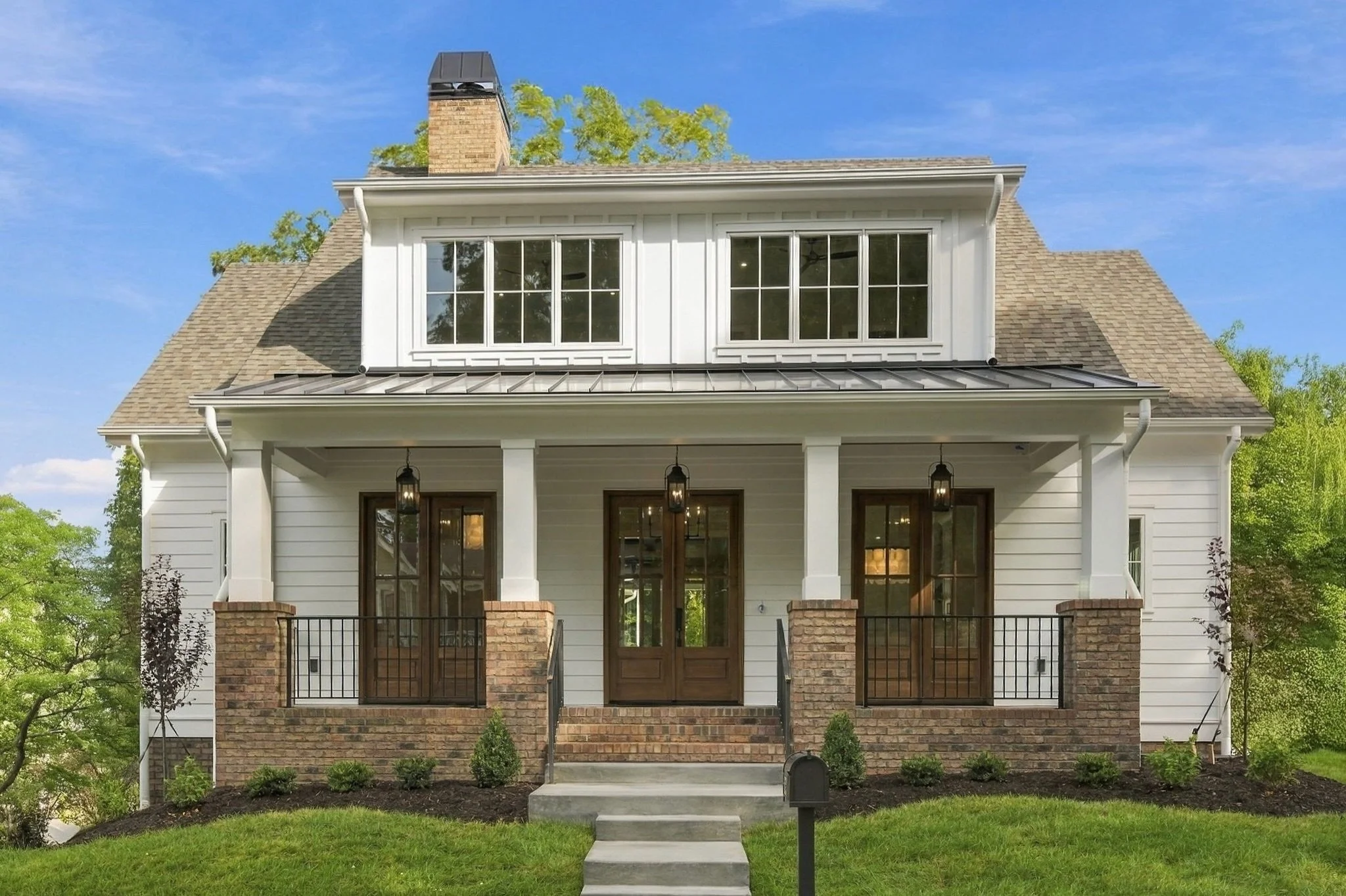 This timeless Carolina Craftsman has so many spaces we love, from the gourmet kitchen and scullery to the back porch with a fireplace and TV, perfect for relaxing at the end of the day. With three stories, four spacious bedrooms, dual offices, and ev