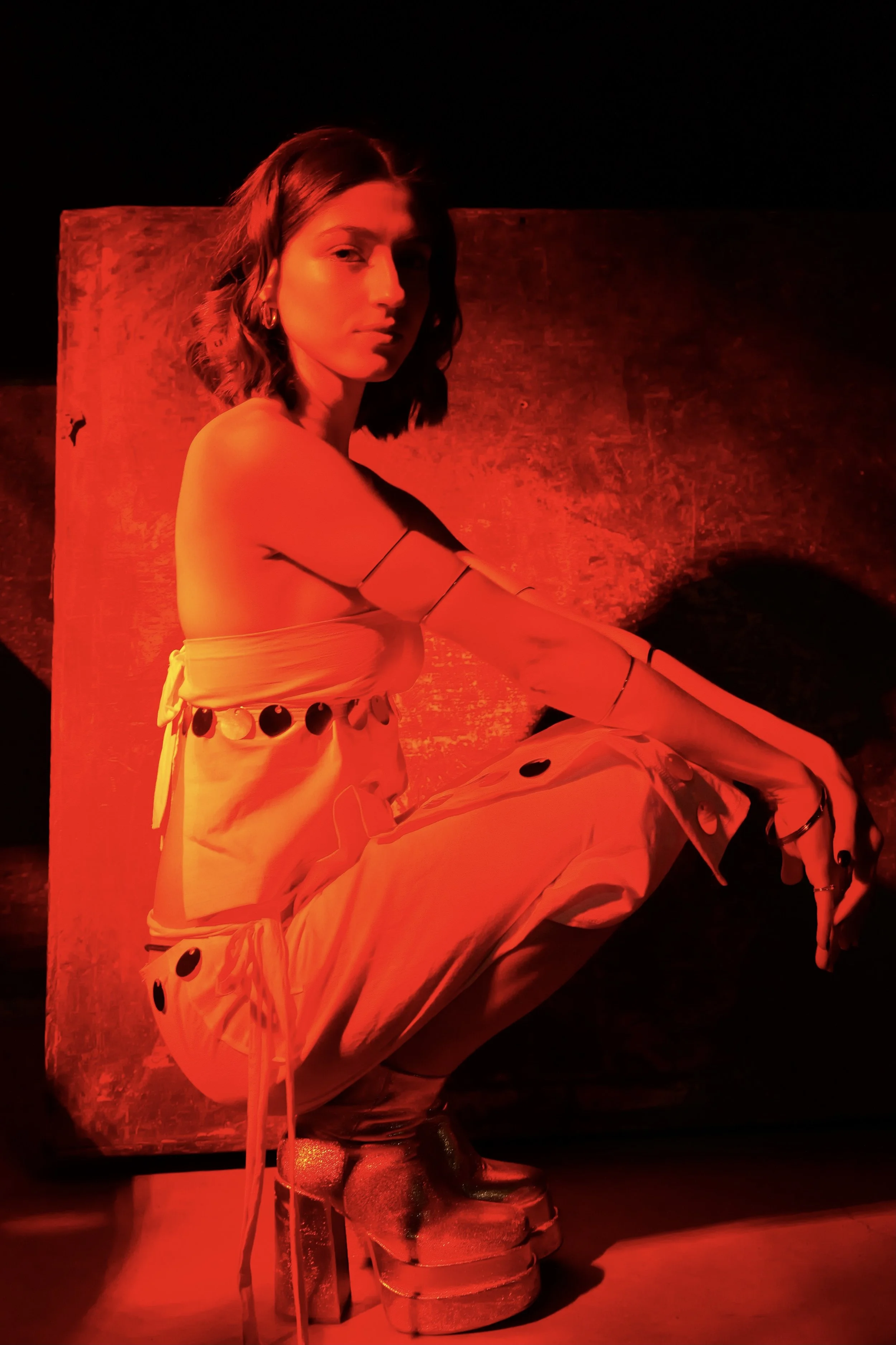 Jasmine, wearing a linen set made from recycled and second-hand fabrics