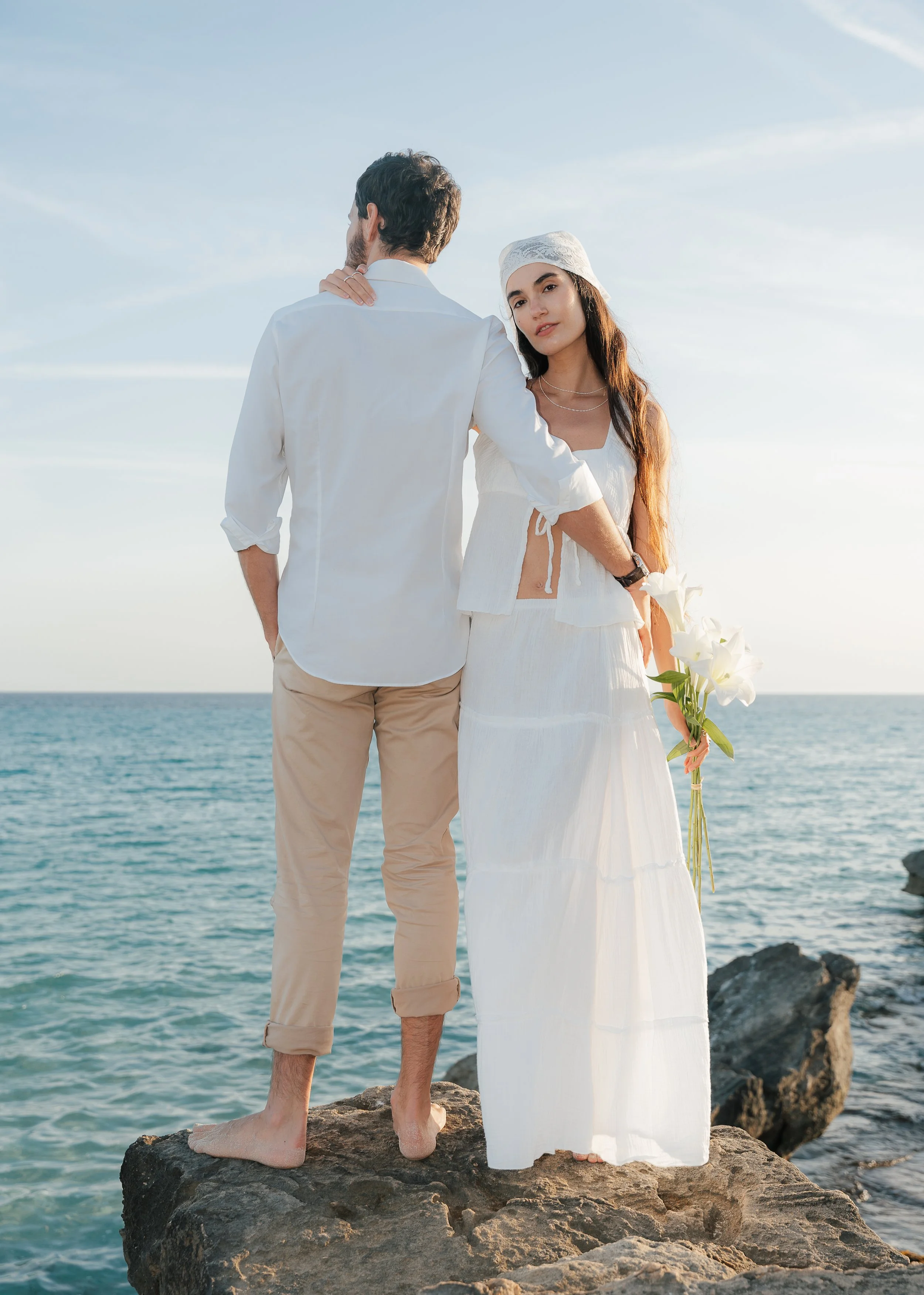 Mallorca Wedding Photography. Beach Lovers. Elopement at the Beacht Mallorca. Romantic couple on the beach in Mallorca during sunset, editorial wedding photography