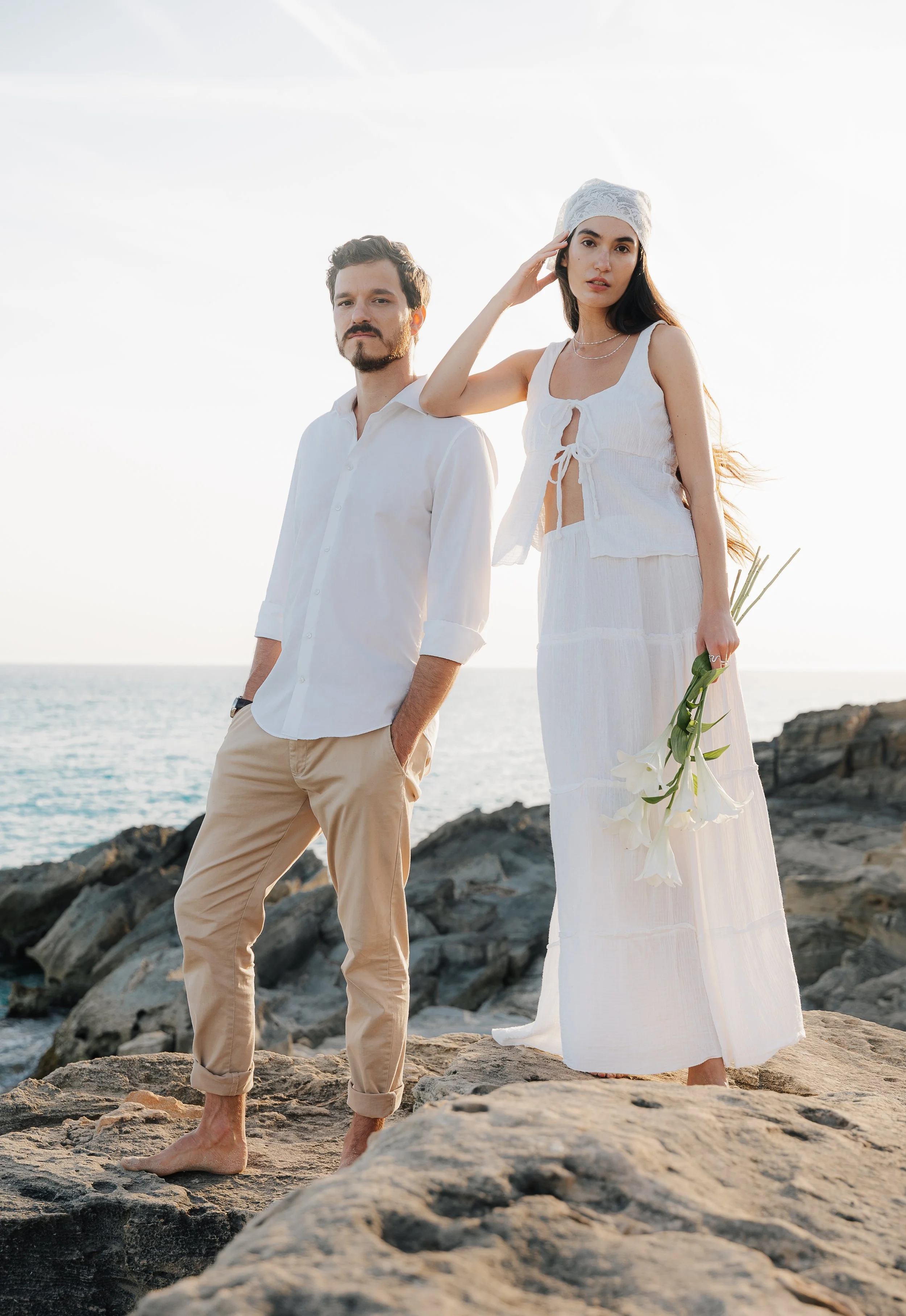 Elegant beach elopement in Mallorca with modern bridal styling and soft light. Mallorca Wedding Photographer