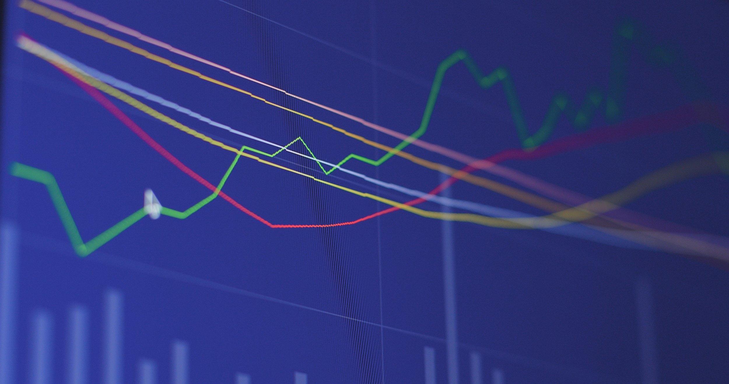 A computer screen displaying a graph with multiple colorful lines representing data trends over time.