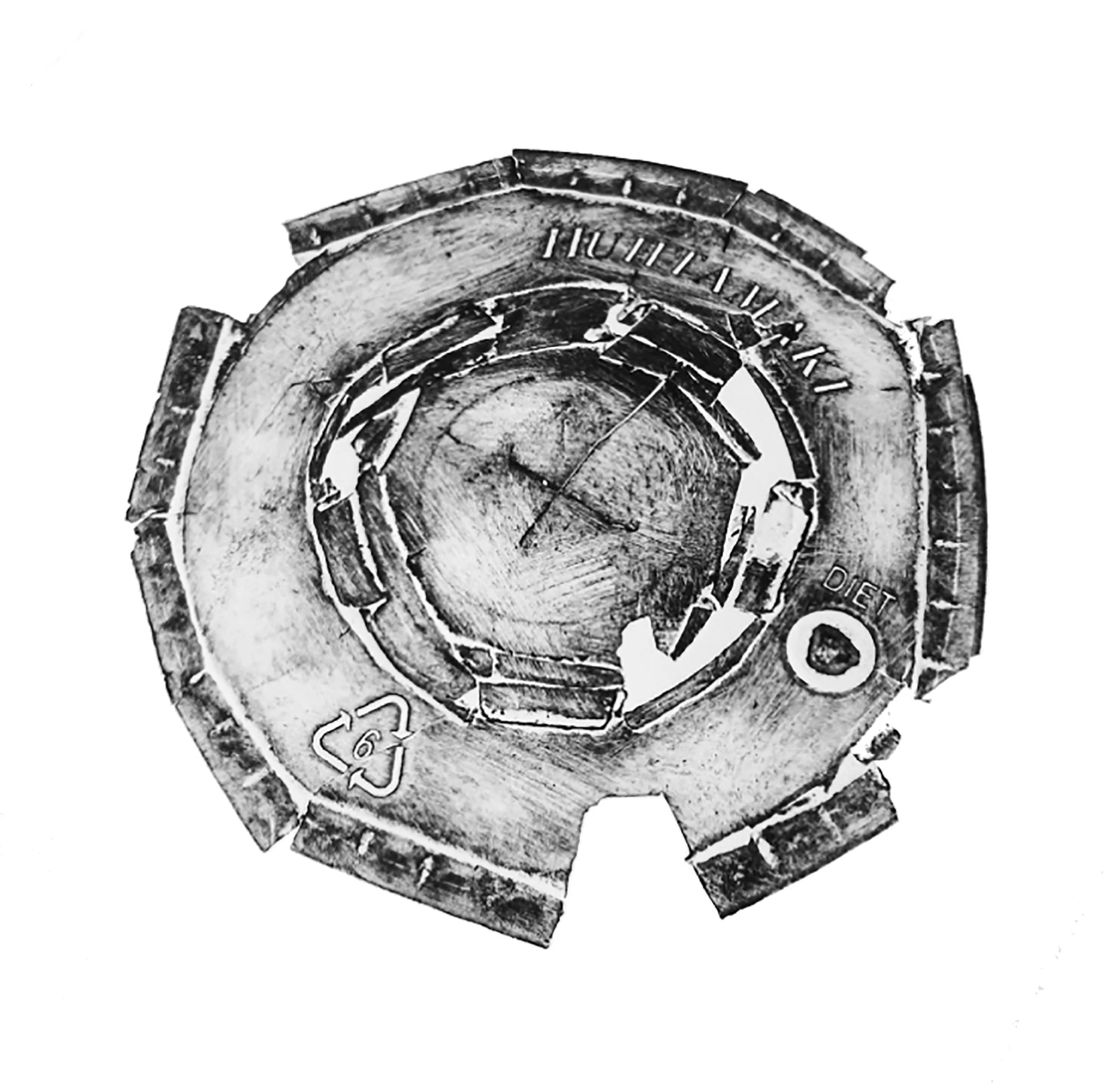 Close-up of a damaged coin with scratches and visible text, black and white image.