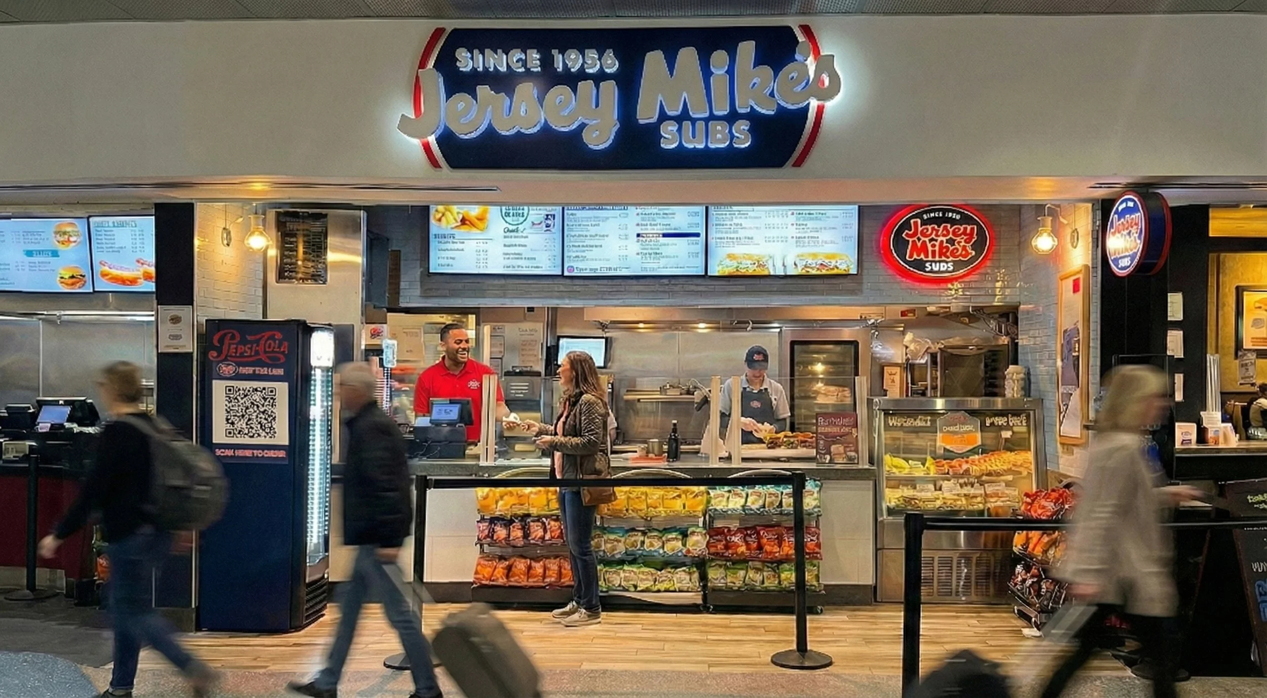 Image of person purchasing a sub at Jersey Mike's