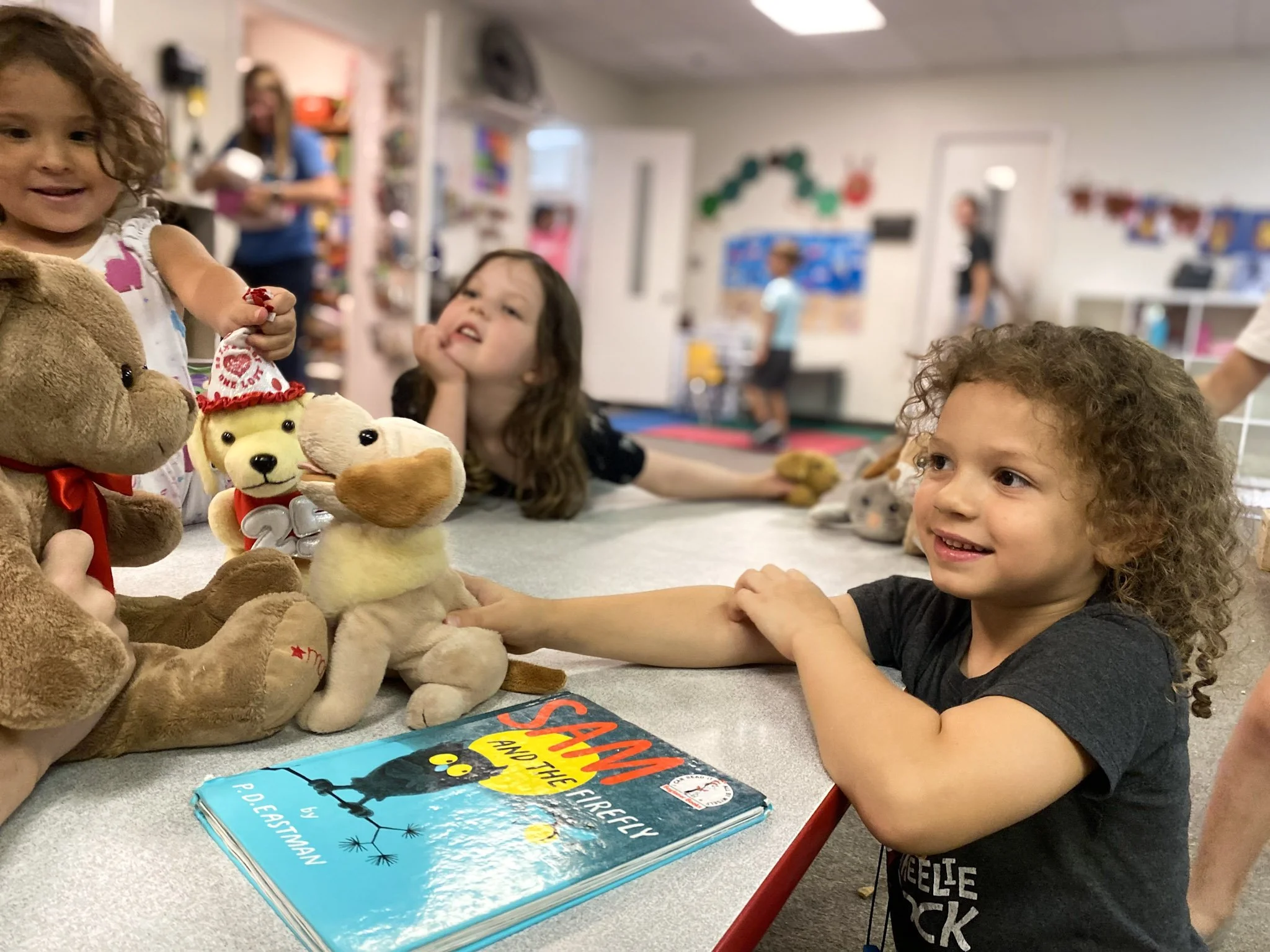 Children playing with stuffed animals. ABA Early Intervention in Chandler, AZ