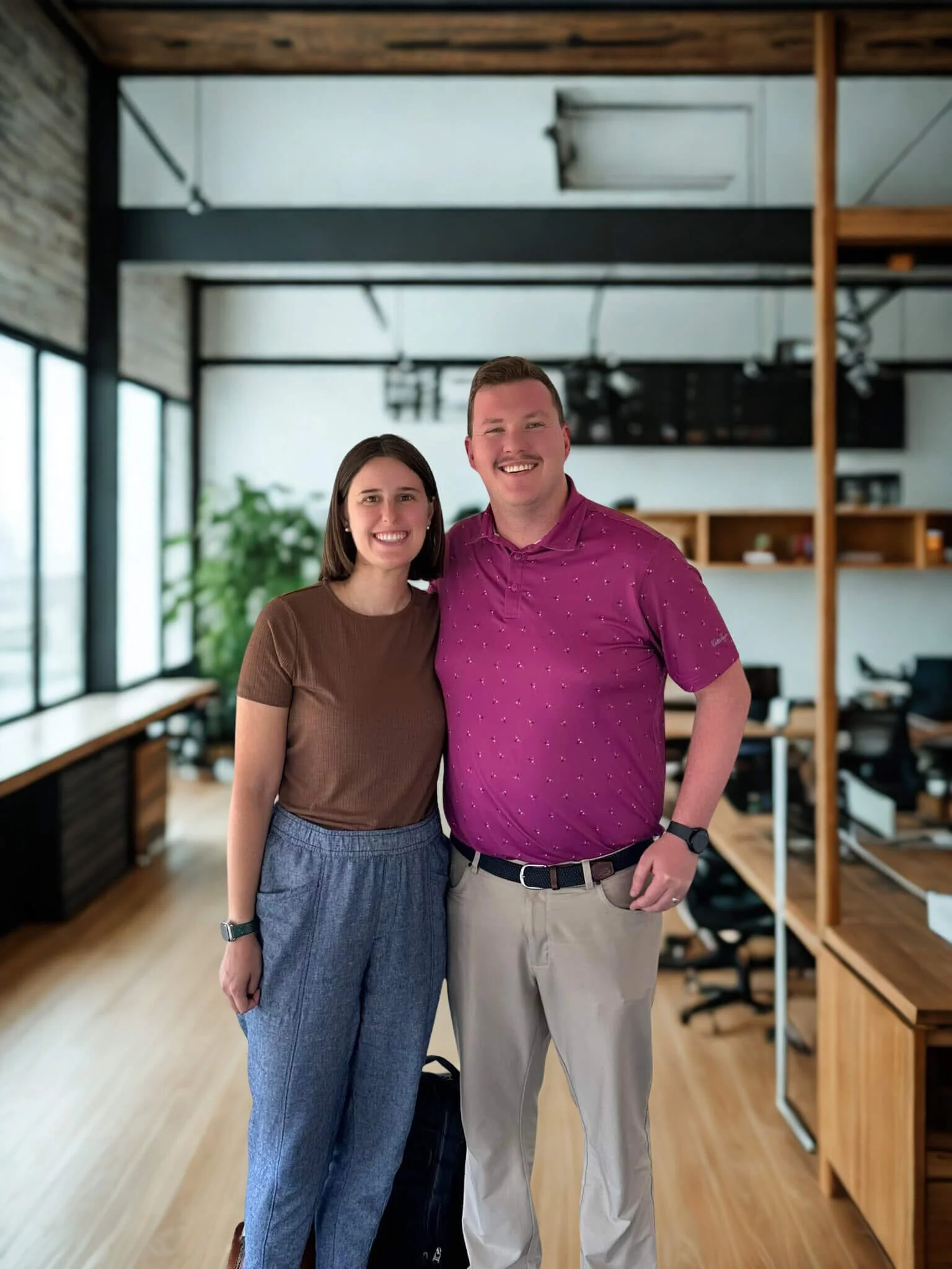 Rueben Wuerdeman, a top Eureka MO real estate agent, standing next to a man and a woman smiling because they just closed on their new home in Eureka MO