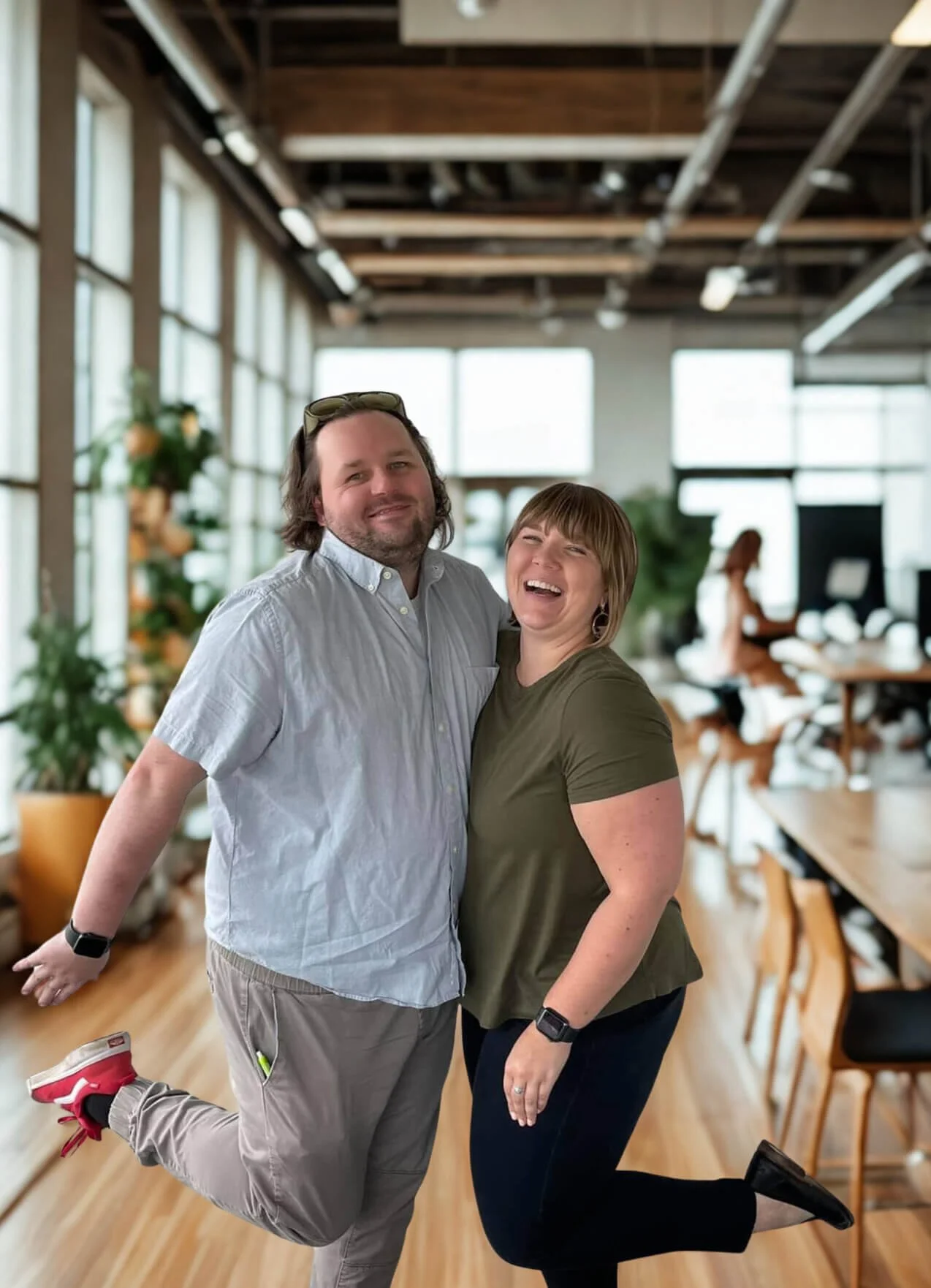 Rueben Wuerdeman, a top Eureka MO real estate agent, standing next to his client a man and woman smiling and dancing because they just closed on their new home in Eureka MO 