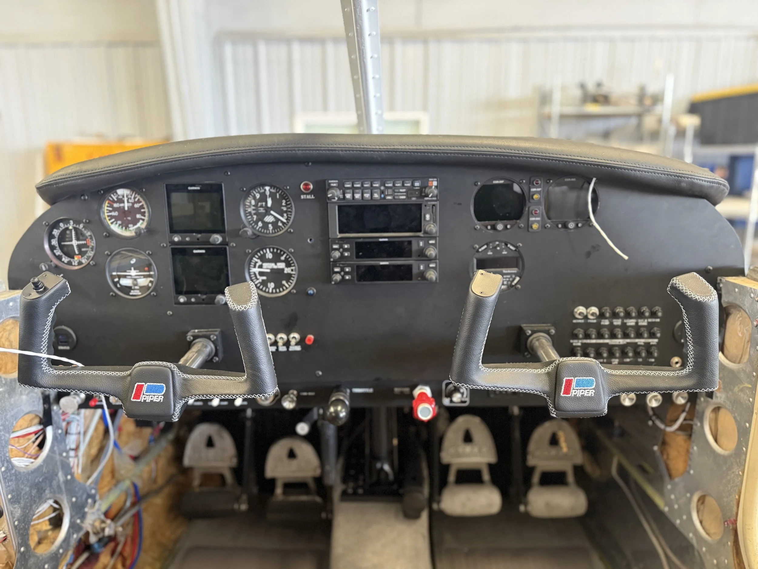 Volare Aviation Piper Cherokee on the ramp in Rock Hill Flight instructor briefing a student before a Discovery Flight Glass cockpit in Volare Aviation training aircraft Volare Aviation team in Rock Hill South Carolina