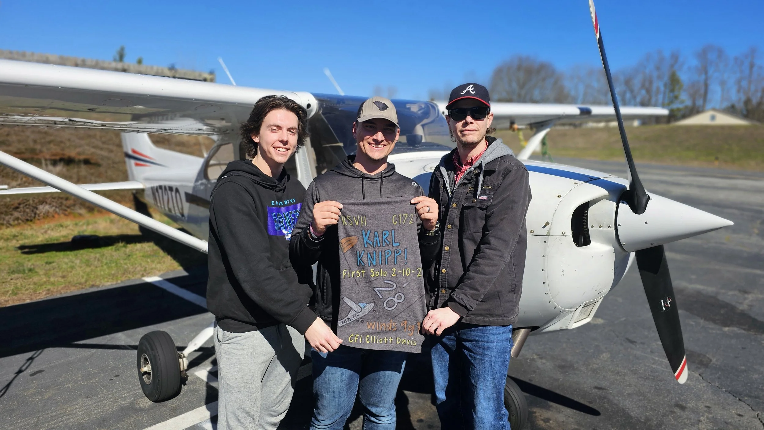 Volare Aviation Piper Cherokee on the ramp in Rock Hill Flight instructor briefing a student before a Discovery Flight Glass cockpit in Volare Aviation training aircraft Volare Aviation team in Rock Hill South Carolina