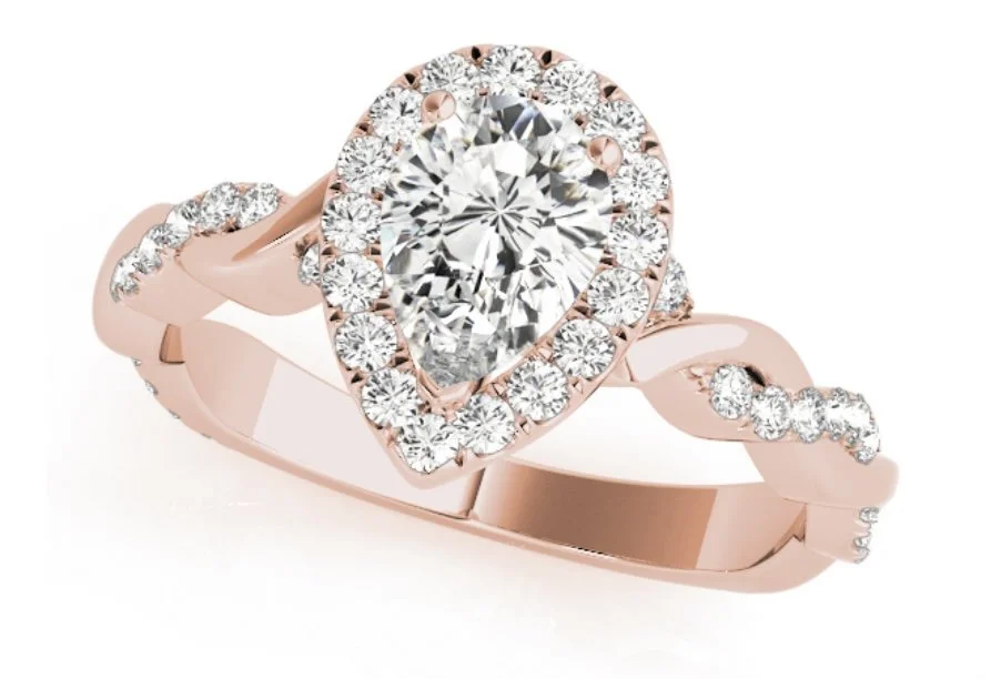 Rose gold ring with a heart-shaped cluster of diamonds on top and additional diamonds along the band.