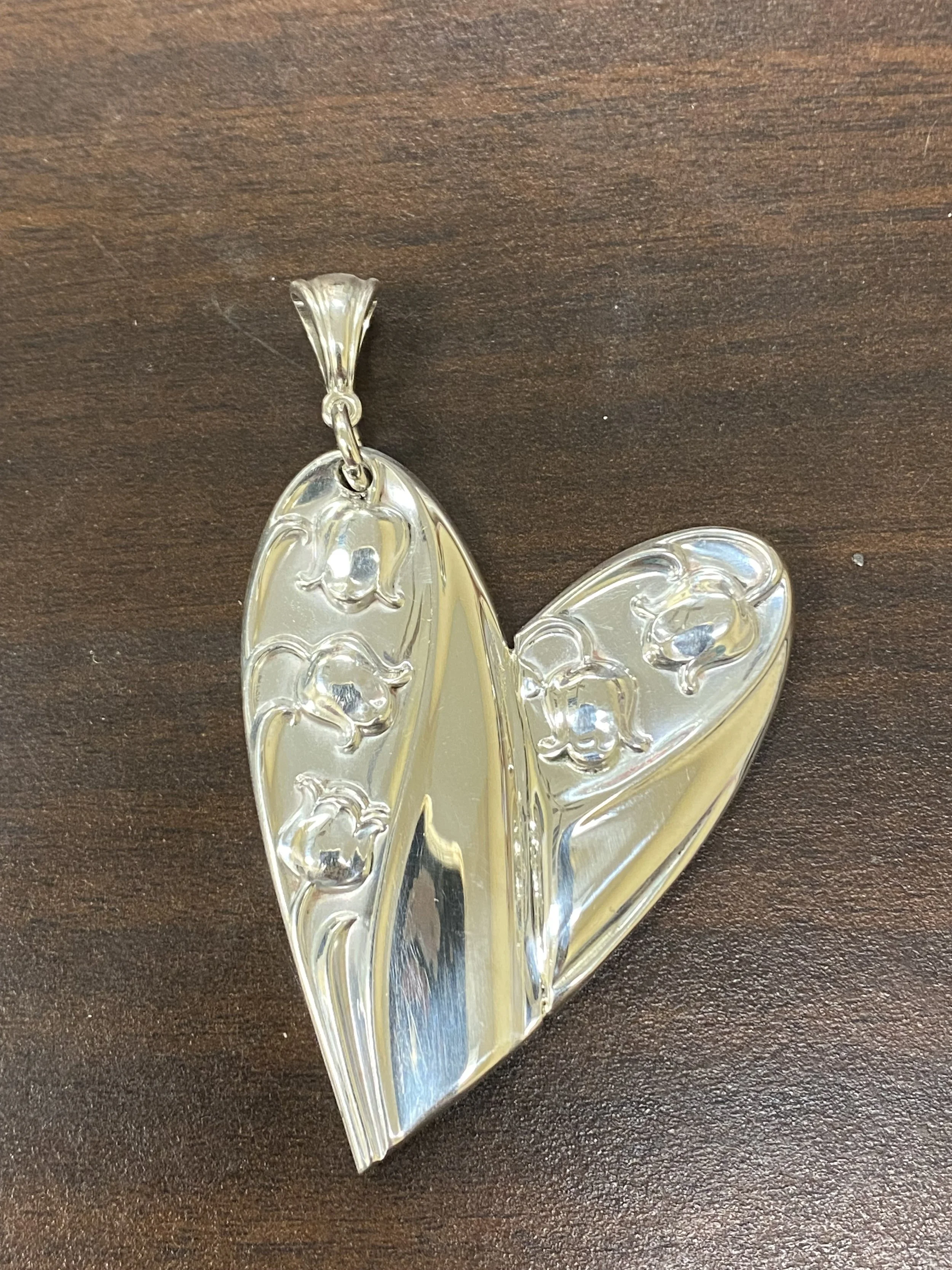 Heart pendant made from customer's silver flatware