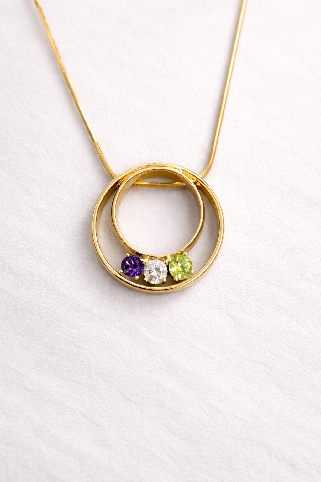 Wedding bands and engagement diamond with childrens' birthstones