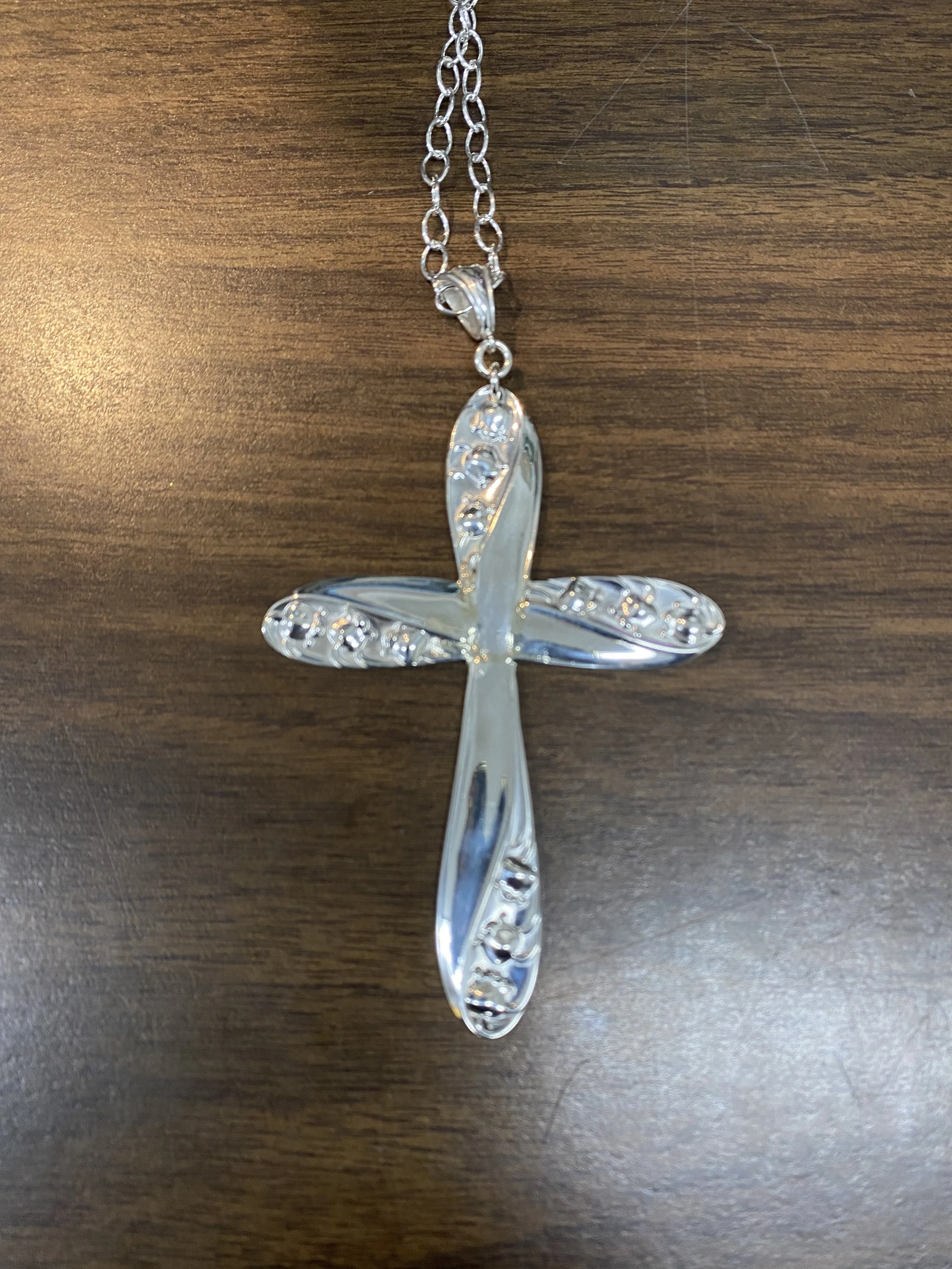 Cross made from customer's silver flatware