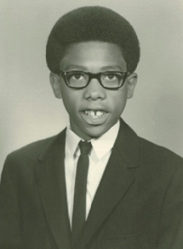 Black and white portrait of young Dr. Cornel West 