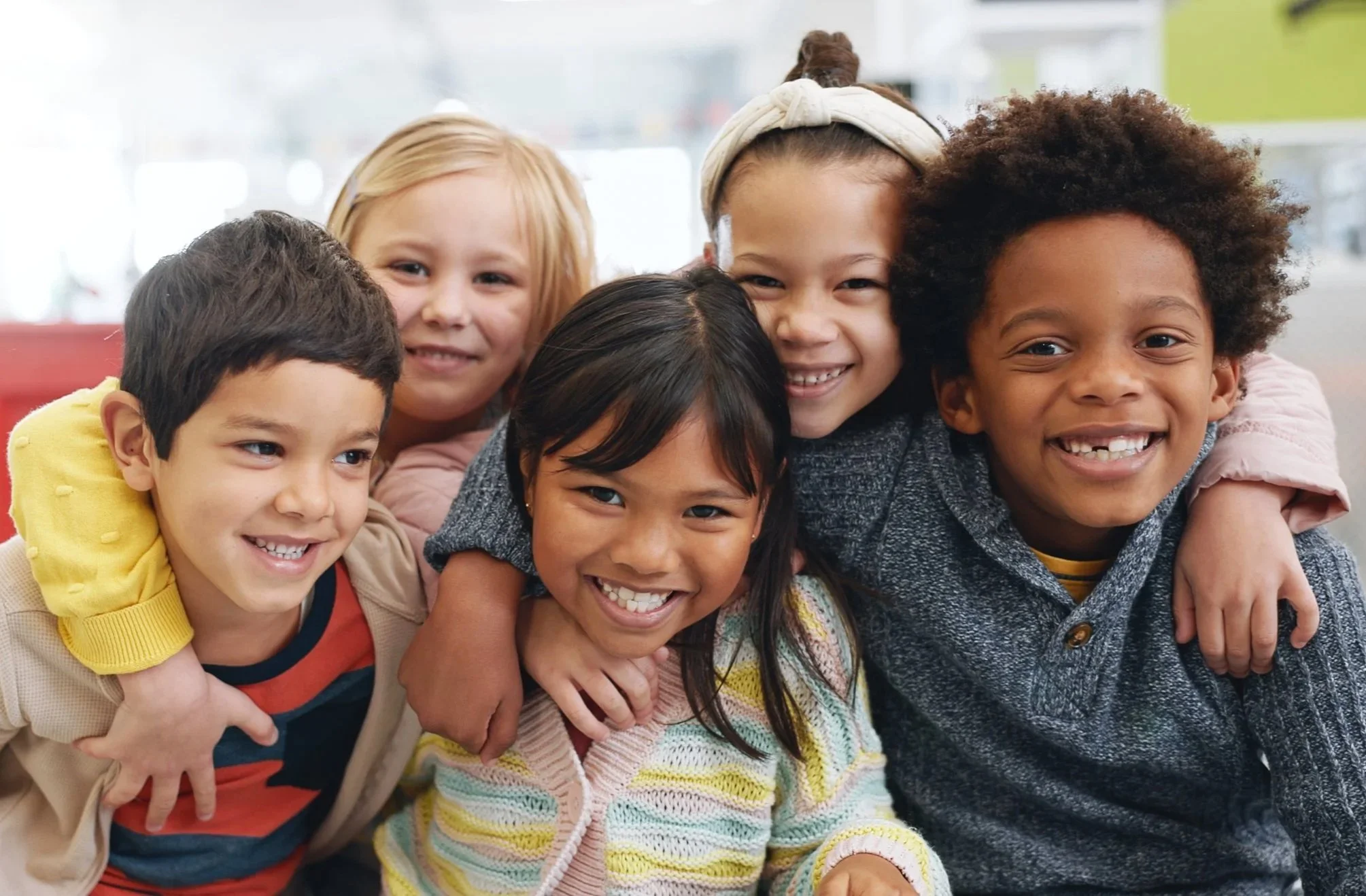 a group of smiling, happy children