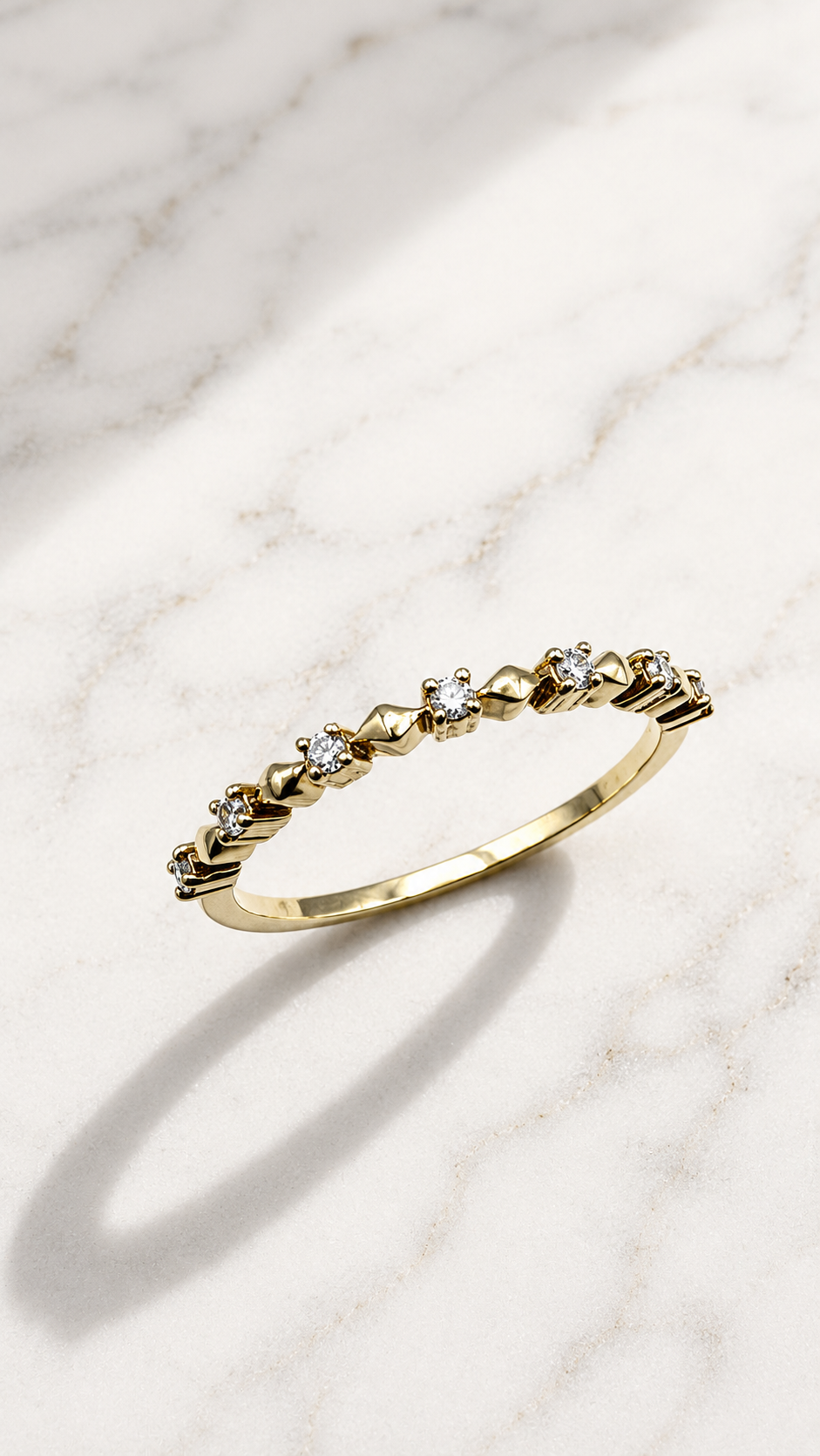 Round lab-grown diamond ring in 9ct yellow gold — round brilliants alternating with geometric gold accents. The Minimal Stack Edit, Gugunava Jewelry, London.