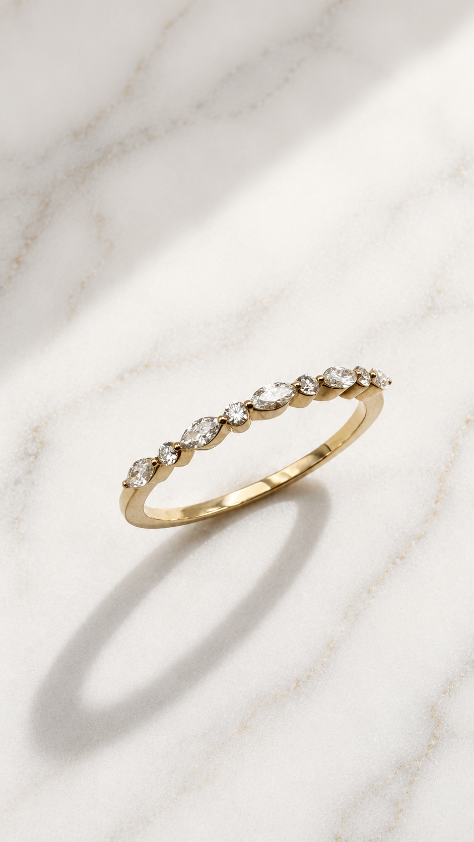 Marquise eternity lab-grown diamond ring in 9ct yellow gold — east-west marquise alternating with round brilliants. The Minimal Stack Edit, Gugunava Jewelry, London.