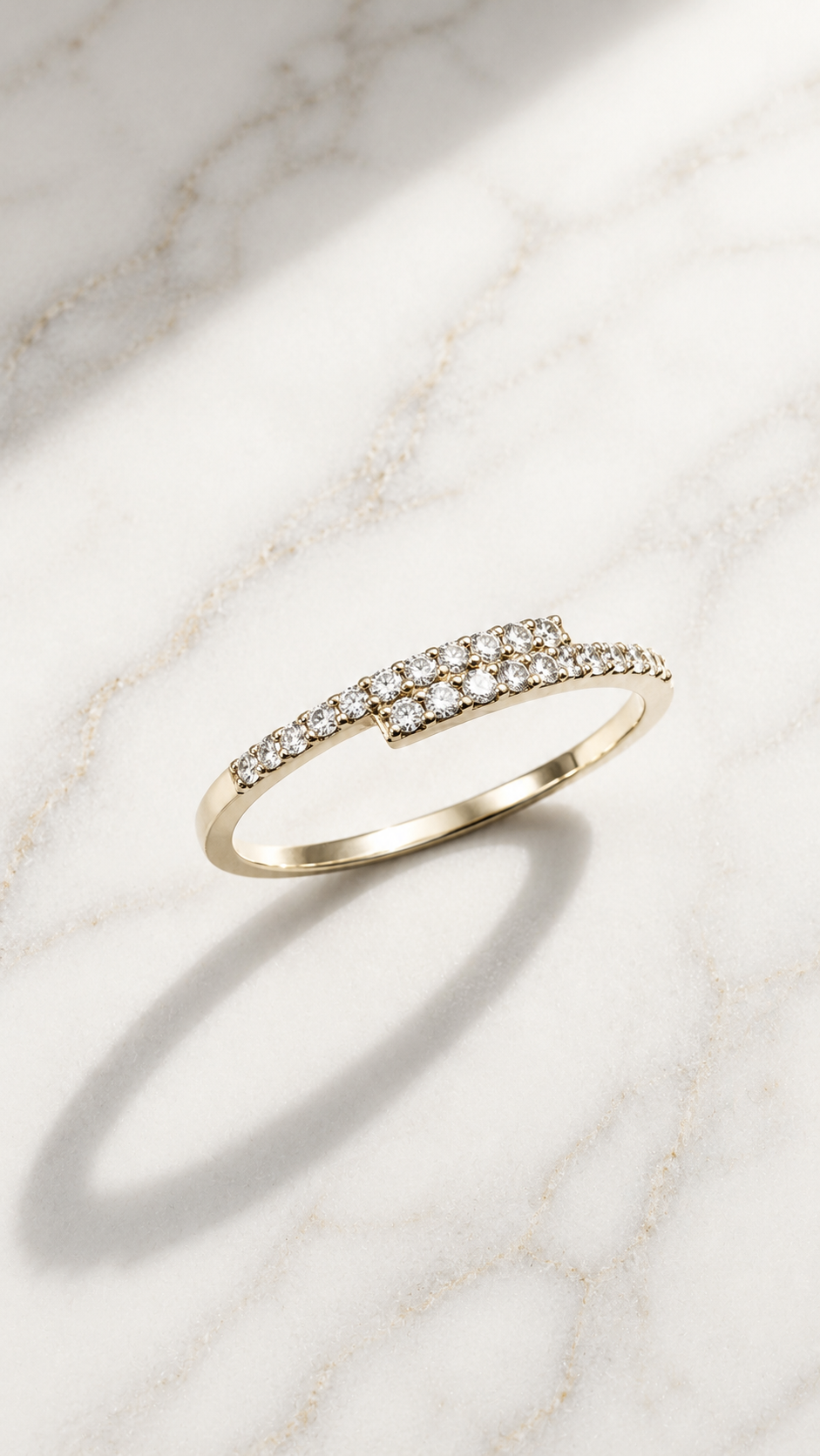 Pavé bypass lab-grown diamond ring in 9ct yellow gold — a double row of micro-pavé crossing at the front. The Minimal Stack Edit, Gugunava Jewelry, London.