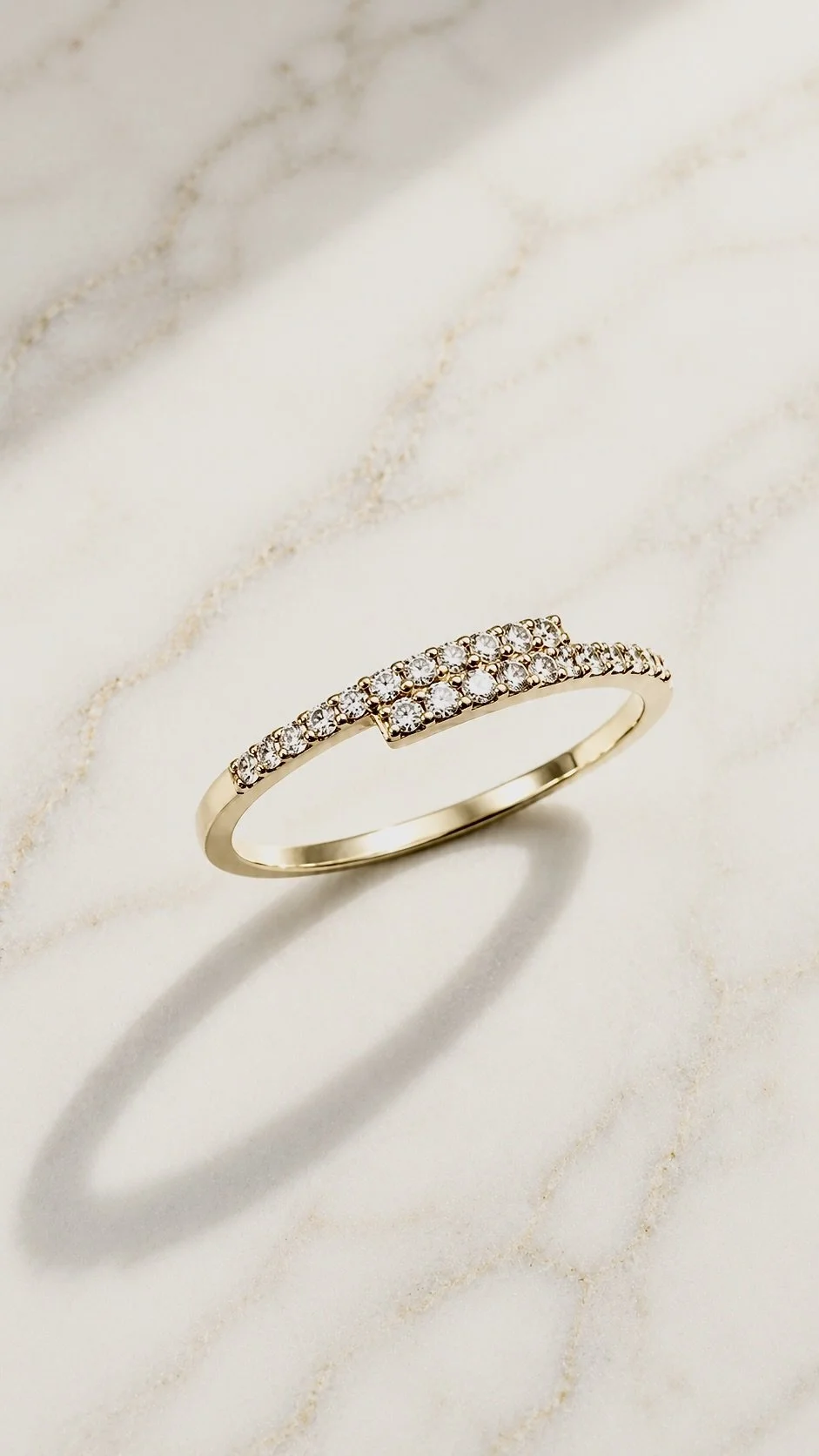 Pavé bypass lab-grown diamond ring in 9ct yellow gold — a double row of micro-pavé crossing at the front. The Minimal Stack Edit, Gugunava Jewelry, London.