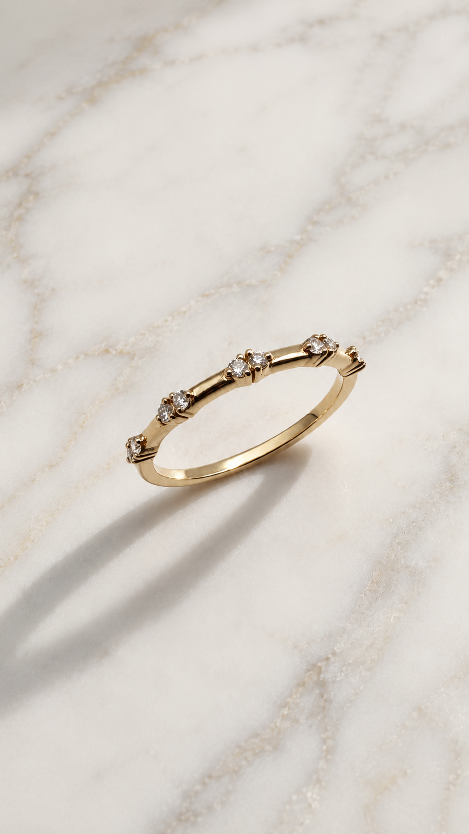 Spaced round lab-grown diamond ring in 9ct yellow gold — evenly spaced round brilliants on a thin band. The Minimal Stack Edit, Gugunava Jewelry, London