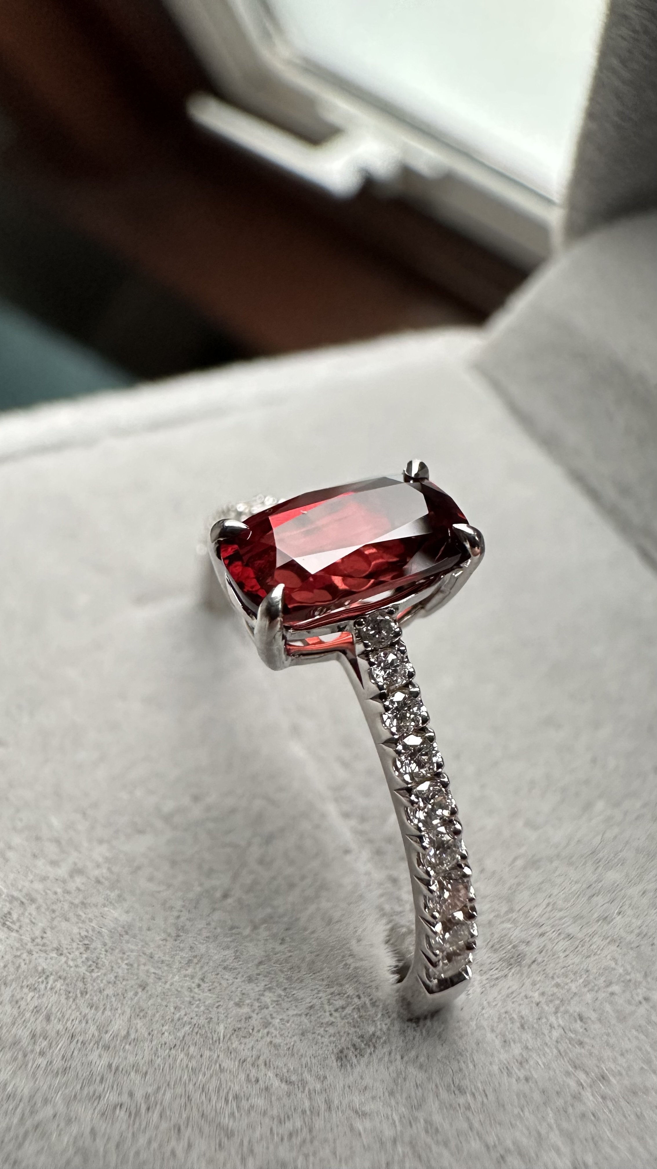 Fire Blossom close-up — red spinel centre stone in eagle claw prong setting, 14K white gold, Gugunava Jewelry London