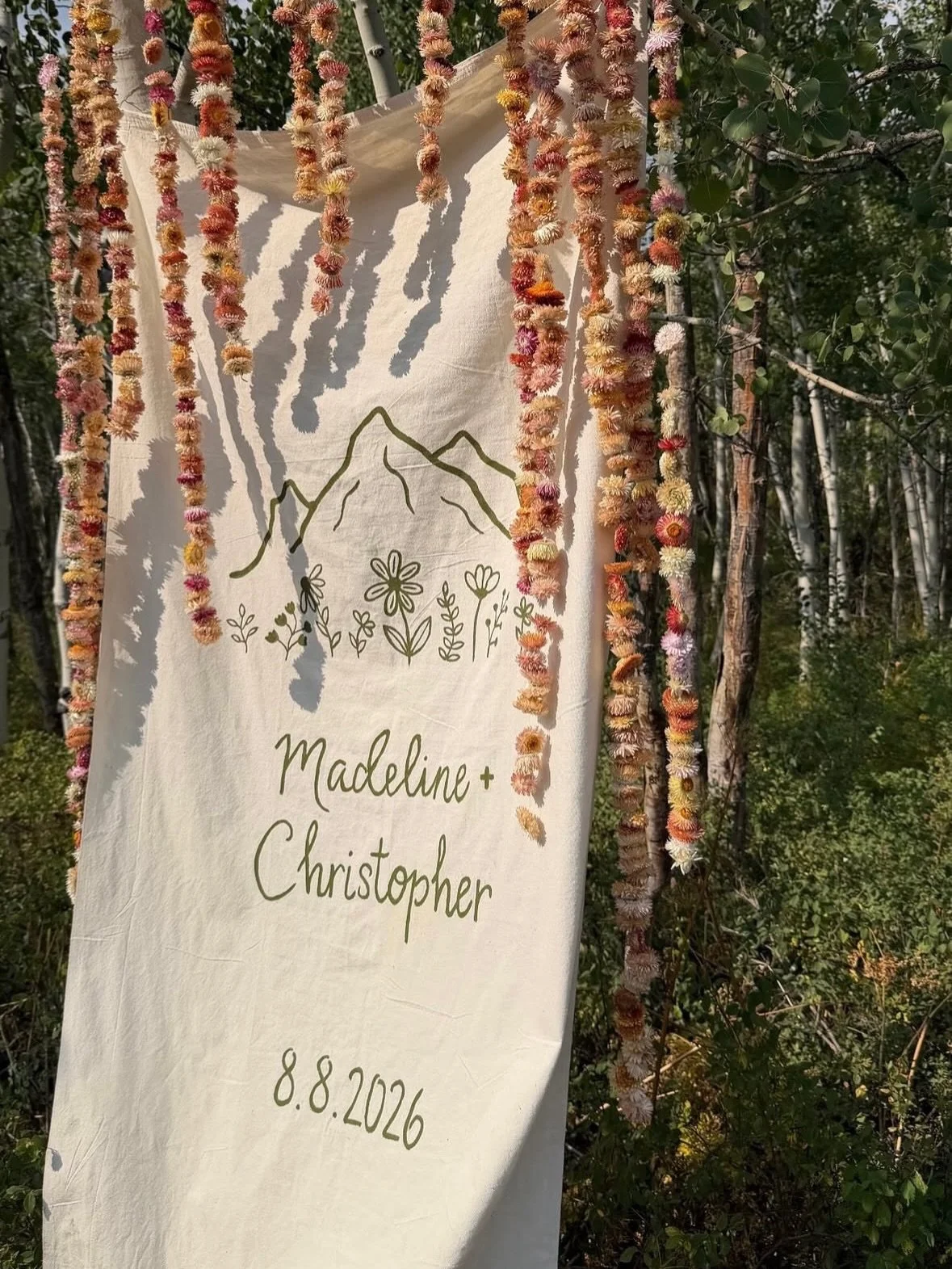 Custom linen wedding banner, hand painted my me! 

I love how this woodsy whimsical esthetic came together and the banner helped to bring the brides vision to life! ⛰️🧚💍🪻

#wedding #weddingideas #mountainwedding #bannerdesign #weddingsign