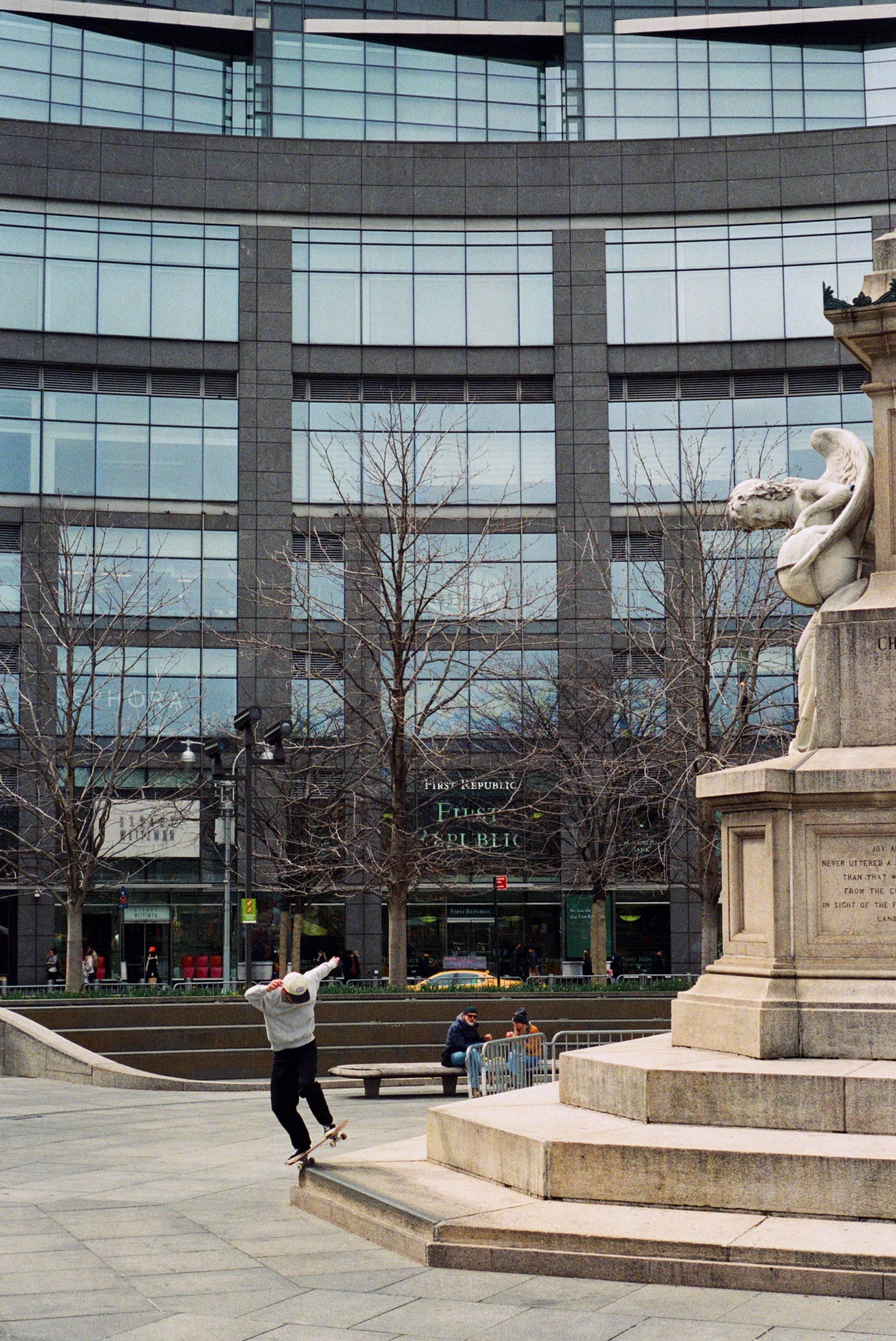 Noah Chee-How, switch pivot grind, Columbus Circle, March 2022.jpg