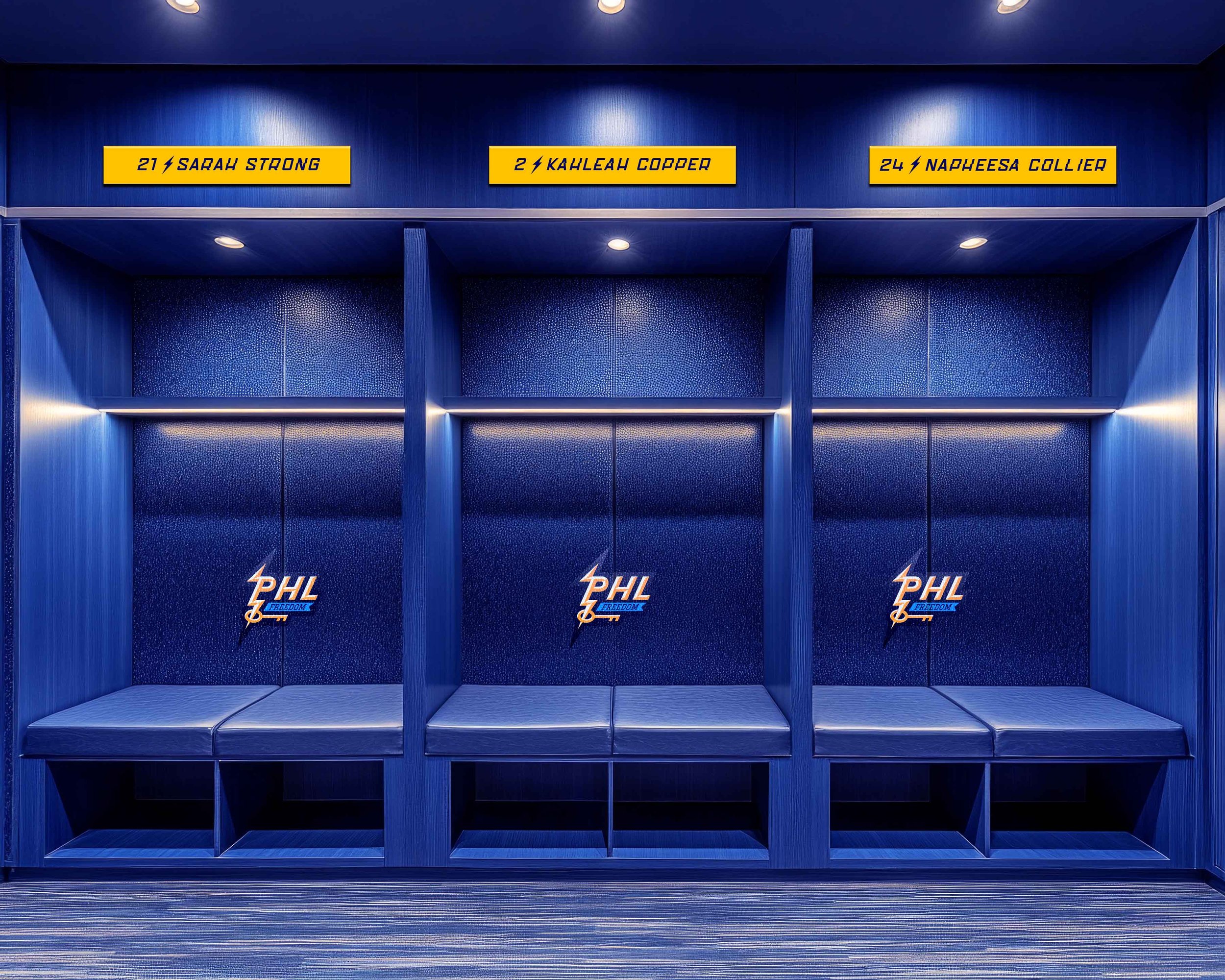Three blue locker stalls branded with the PHL Freedom lightning logo, each topped with yellow nameplates reading Sarah Strong, Kahleah Copper, and Napheesa Collier.