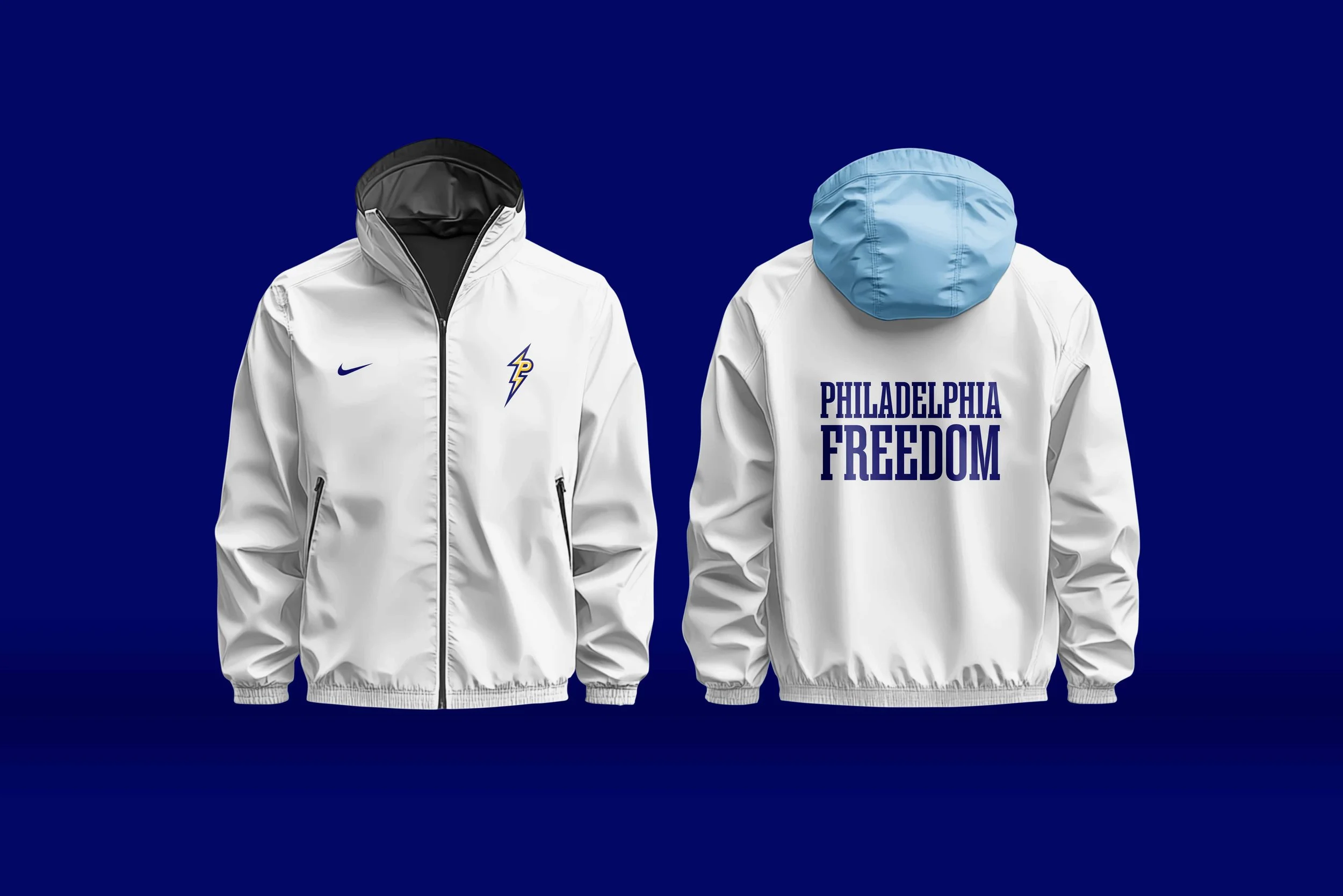 A white and navy basketball warm-up jacket with light blue trim and a bold “P” lightning-inspired logo on the left chest, displayed flat against a dark blue background.