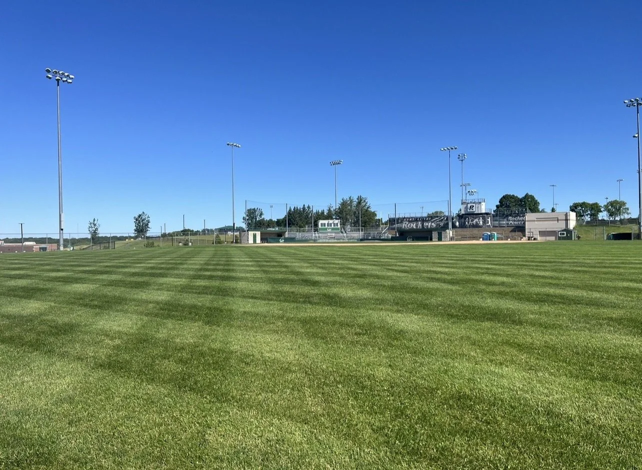Freshly mowed lawn managed by Ornell lawn services. 