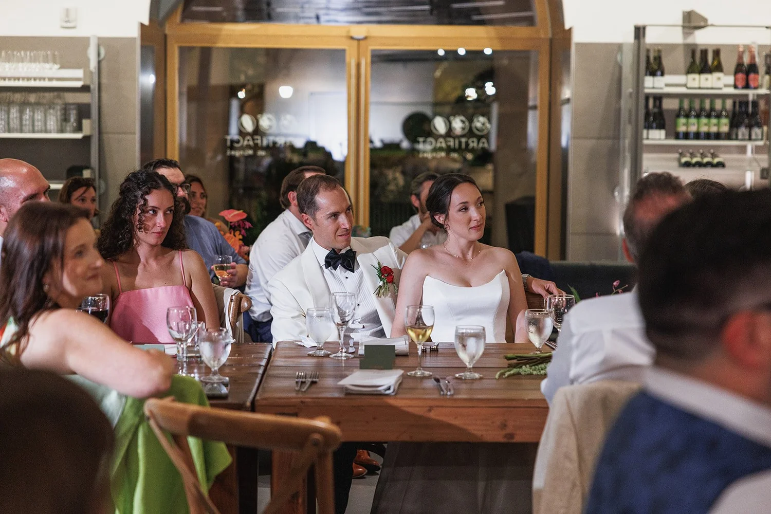 Guests at a long dinner table