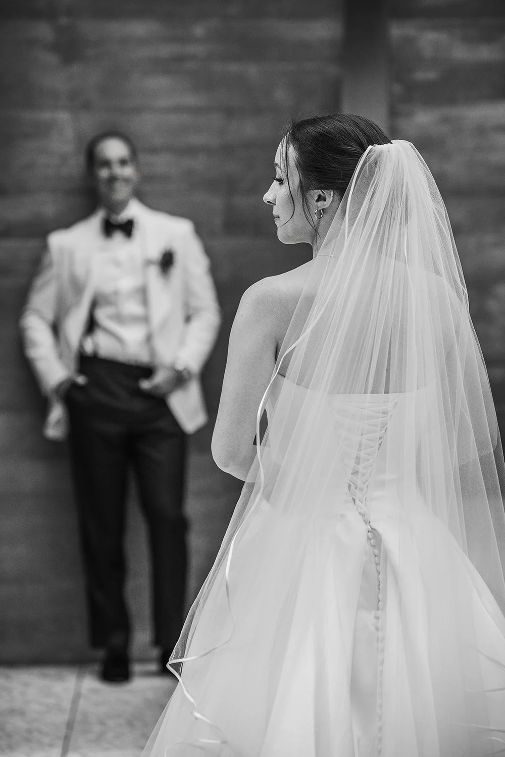 Bride and groom first look, black and white