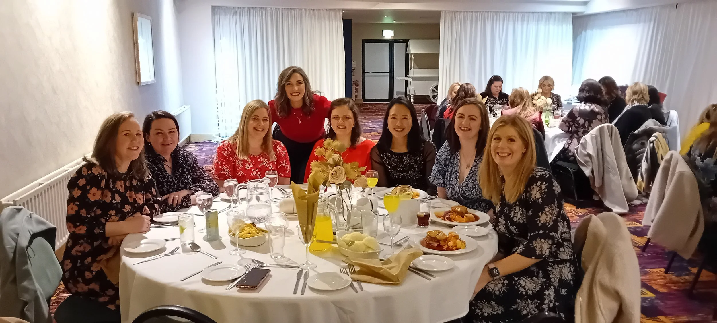 Catholic Mothers Ireland Group at table enjoying Christmas Night Out.jpg