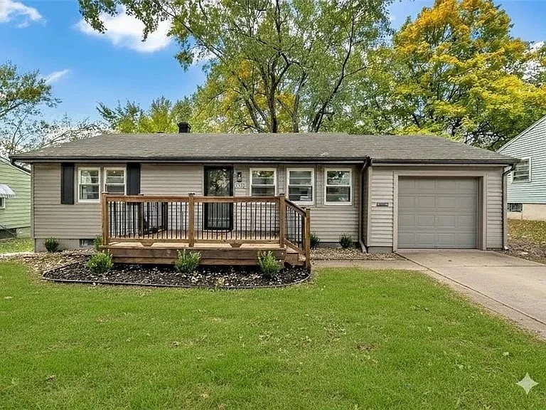 A Strong and stable front porch with black metal spindles. Stained with light walnut and sealed.