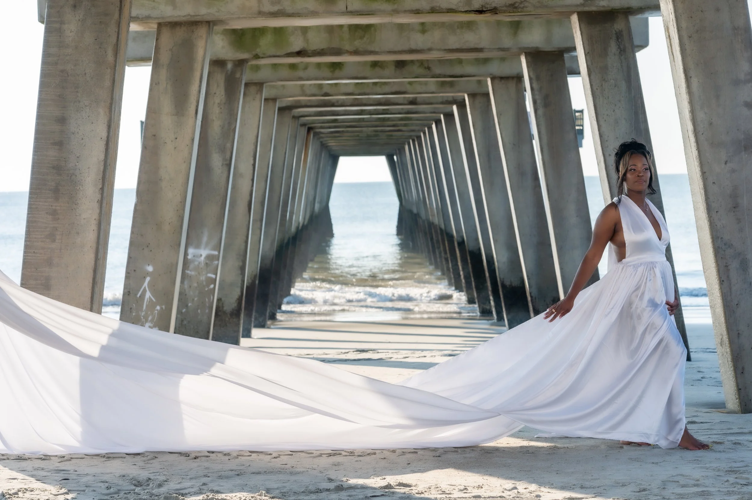 Capture the Magic of a Flying Dress Photoshoot on Tybee Island with Our Professional Photography Services! Elevate your memories with stunning aerial poses, flowing fabrics, and the picturesque backdrop of Tybee Island. Our expert full-time photograp