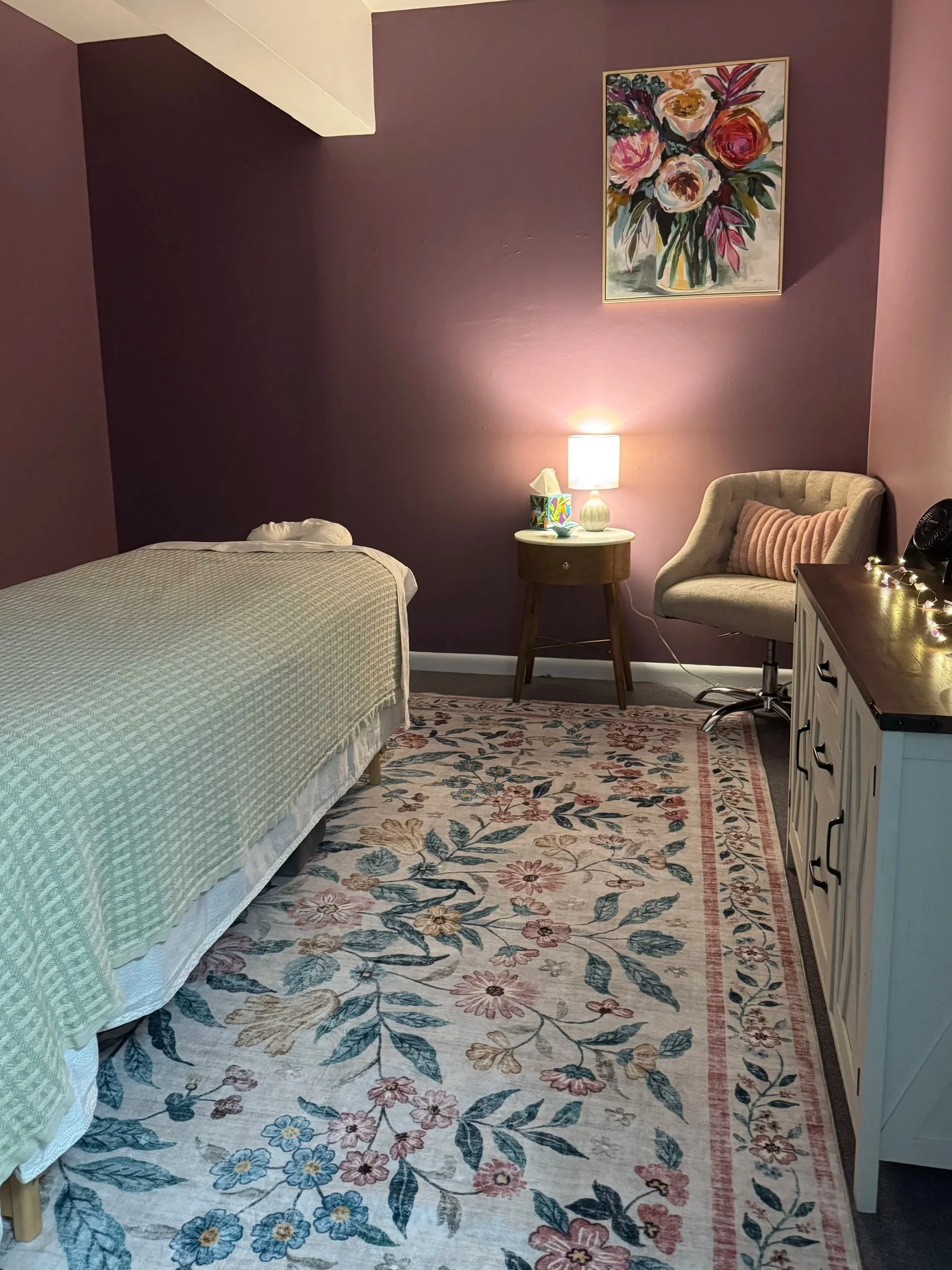 A cozy acupressure treatment room in Easton, MD.  With modern furniture for comfortability a private space for conversation about life events, personal goals and healing