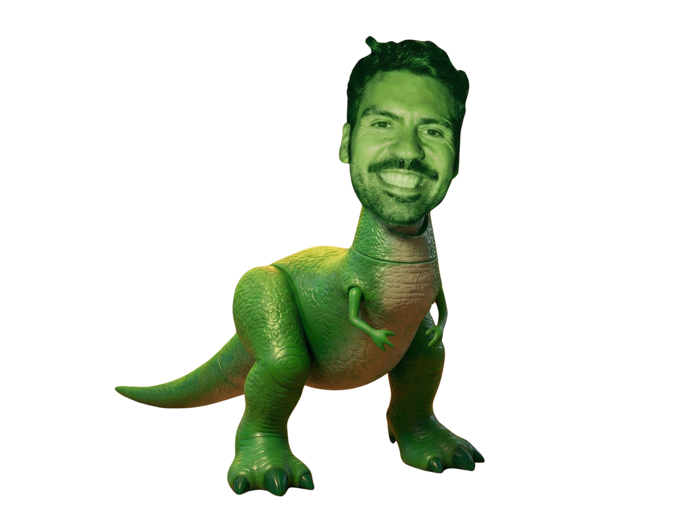 Una criatura de dibujo de dinosaurio de color verde con la cabeza de una persona sonriendo en ella.