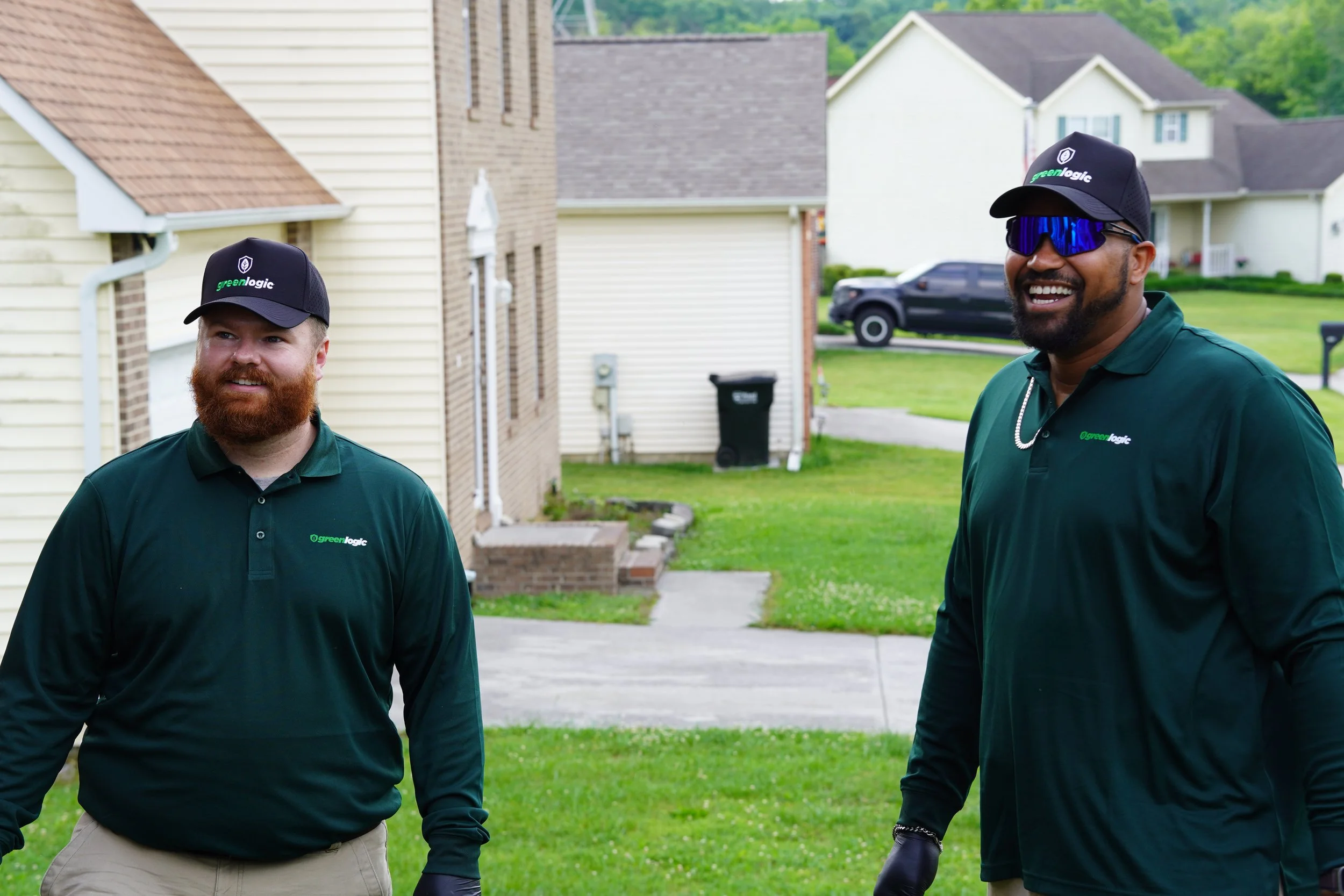 Greenlogic Pest Control General Manager and Service Pro at customer's home