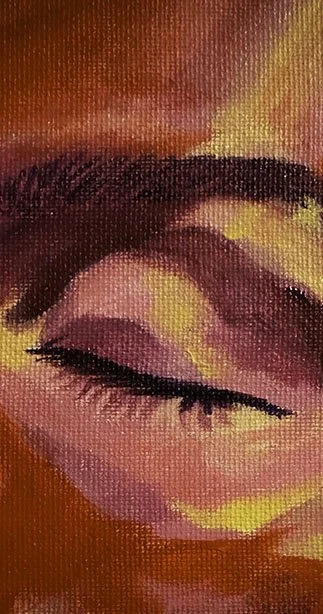 Close-up of a painted face with closed eyes, vibrant red, pink, yellow, and black colors.